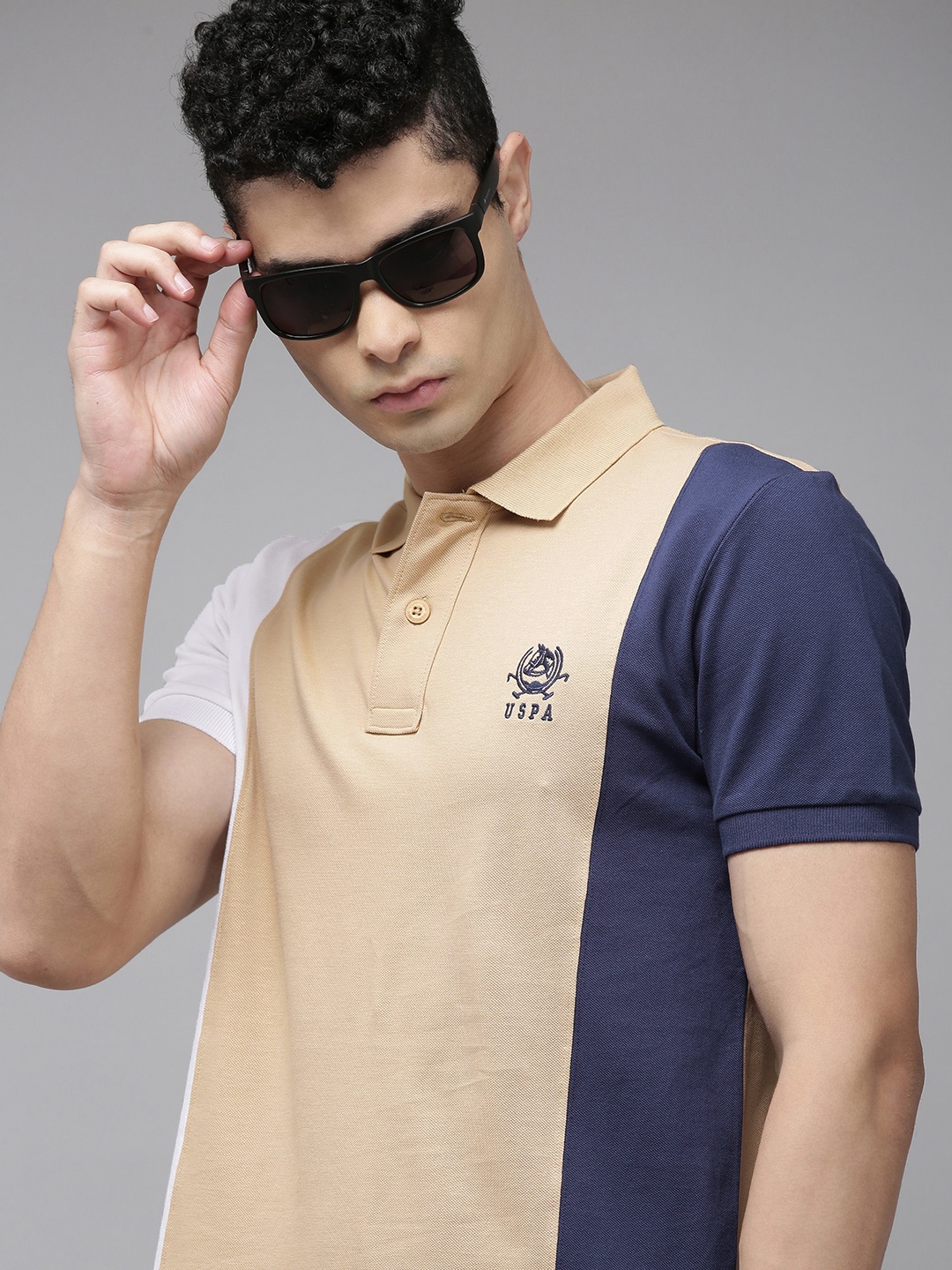 U S Polo Assn Men Beige & Navy Blue Colourblocked Polo Collar Pure Cotton Slim Fit T-shirt
U S Polo Assn Men Beige & Navy Blue Colourblocked Polo Collar Pure Cotton Slim Fit T-shirt