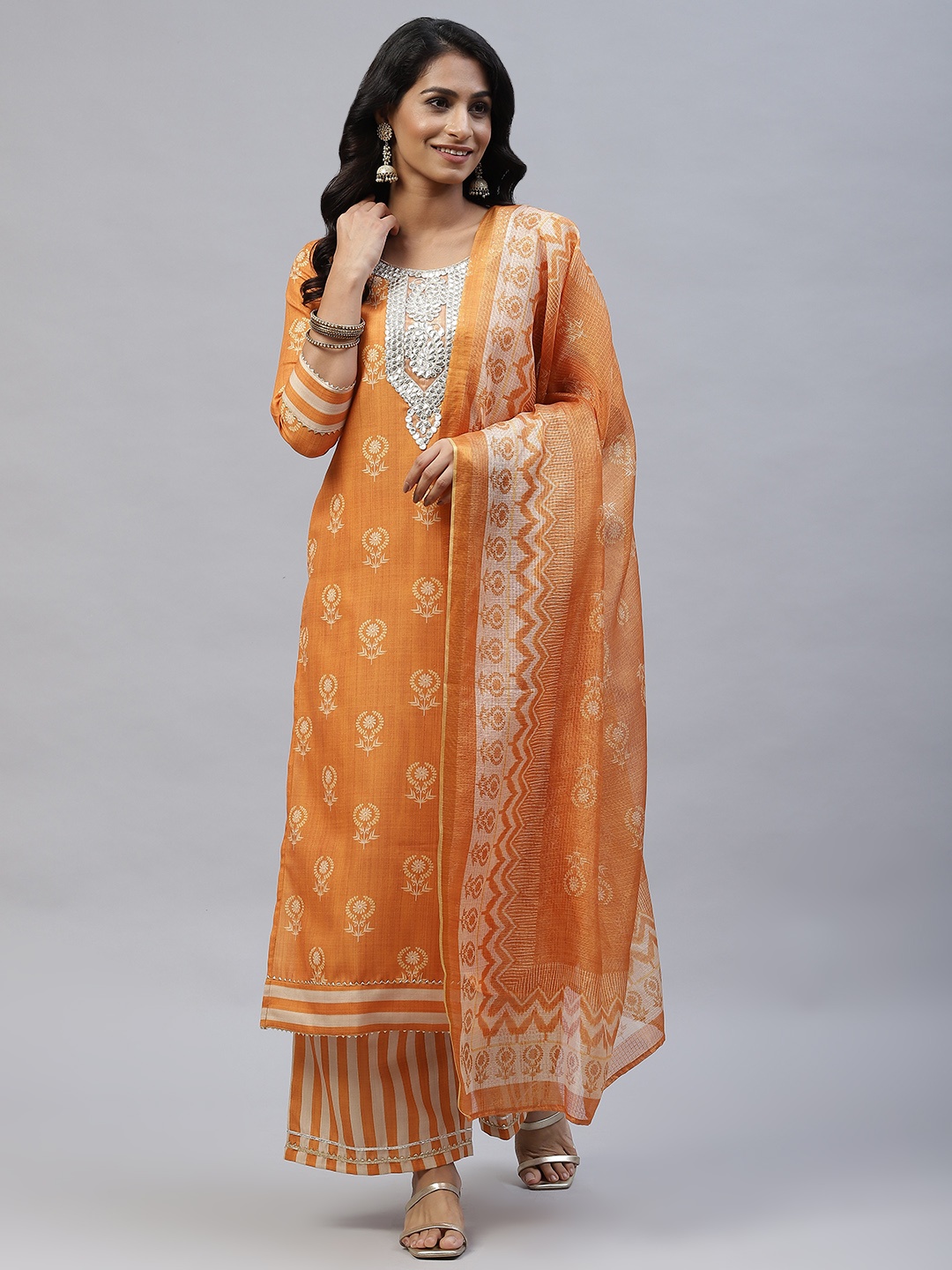 mokshi Women Orange Ethnic Motifs Printed Gotta Patti Linen Kurta with Palazzos & Dupatta
mokshi Women Orange Ethnic Motifs Printed Gotta Patti Linen Kurta with Palazzos & Dupatta