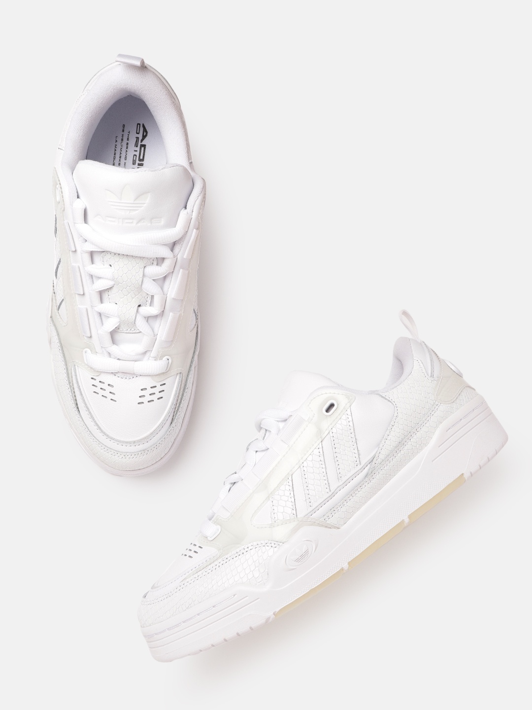 ADIDAS Originals Men White Snake Skin Textured Adi2000 Ogin Perforated Leather Sneakers
ADIDAS Originals Men White Snake Skin Textured Adi2000 Ogin Perforated Leather Sneakers