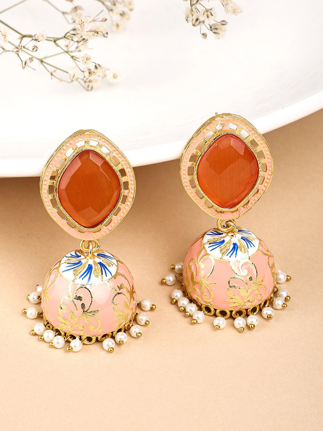 Yellow Chimes Woman Gold plated Orange Meenakari Jhumkas Earrings
Yellow Chimes Woman Gold plated Orange Meenakari Jhumkas Earrings