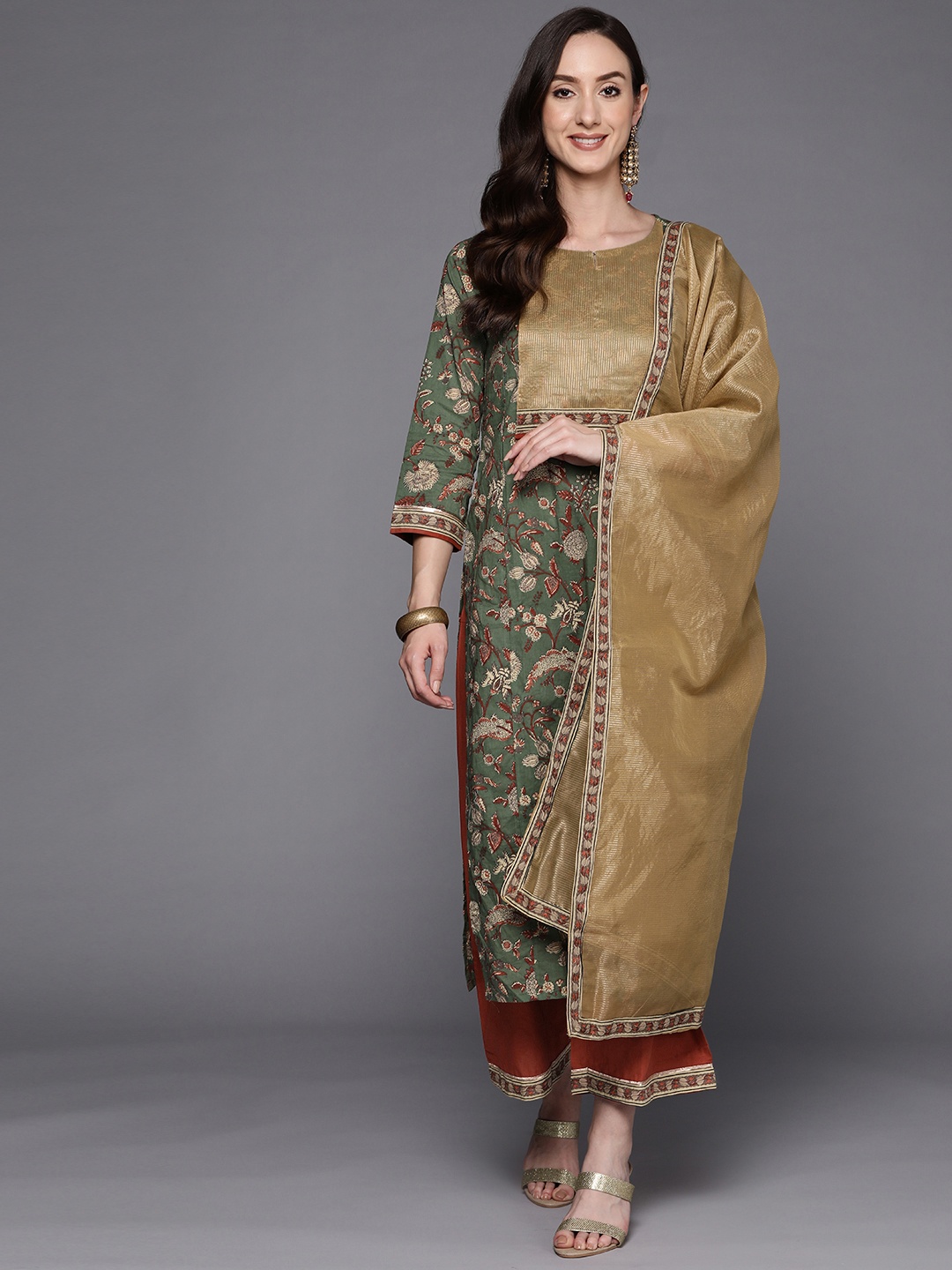 Indo Era Women Green Ethnic Motifs Printed Pure Cotton Kurta with Palazzos & Dupatta
Indo Era Women Green Ethnic Motifs Printed Pure Cotton Kurta with Palazzos & Dupatta