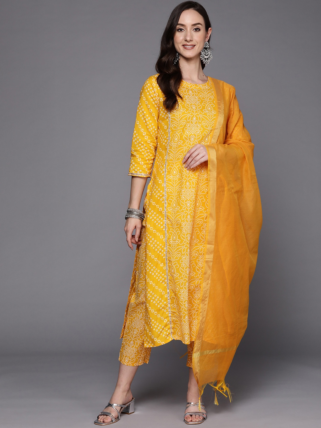 Indo Era Women Yellow Bandhani Panelled Gotta Patti Cotton Kurta with Trousers & Dupatta
Indo Era Women Yellow Bandhani Panelled Gotta Patti Cotton Kurta with Trousers & Dupatta