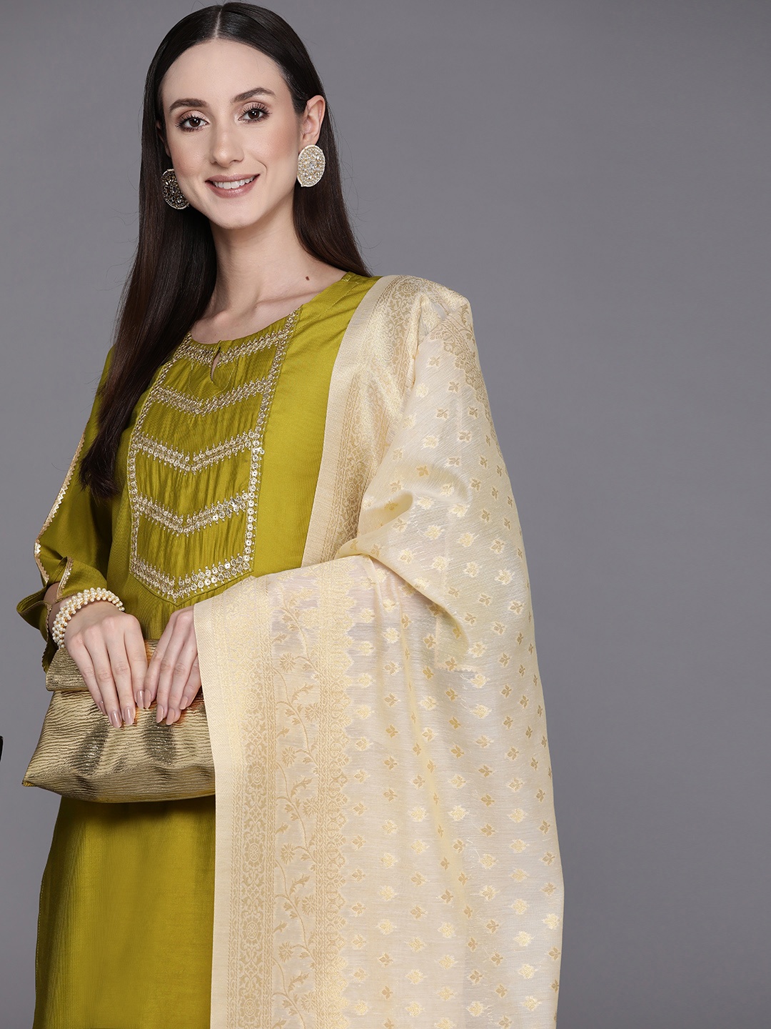Indo Era Women Olive Green Yoke Design Sequinned Liva Kurta with Trousers & With Dupatta
Indo Era Women Olive Green Yoke Design Sequinned Liva Kurta with Trousers & With Dupatta