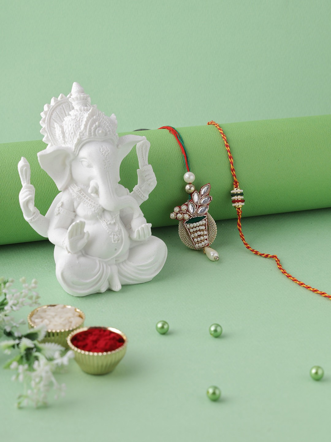 Aapno Rajasthan Set Of 2 Red & Yellow Ganesha Idol With Bhaiya Bhabhi Rakhi Gift Set
Aapno Rajasthan Set Of 2 Red & Yellow Ganesha Idol With Bhaiya Bhabhi Rakhi Gift Set