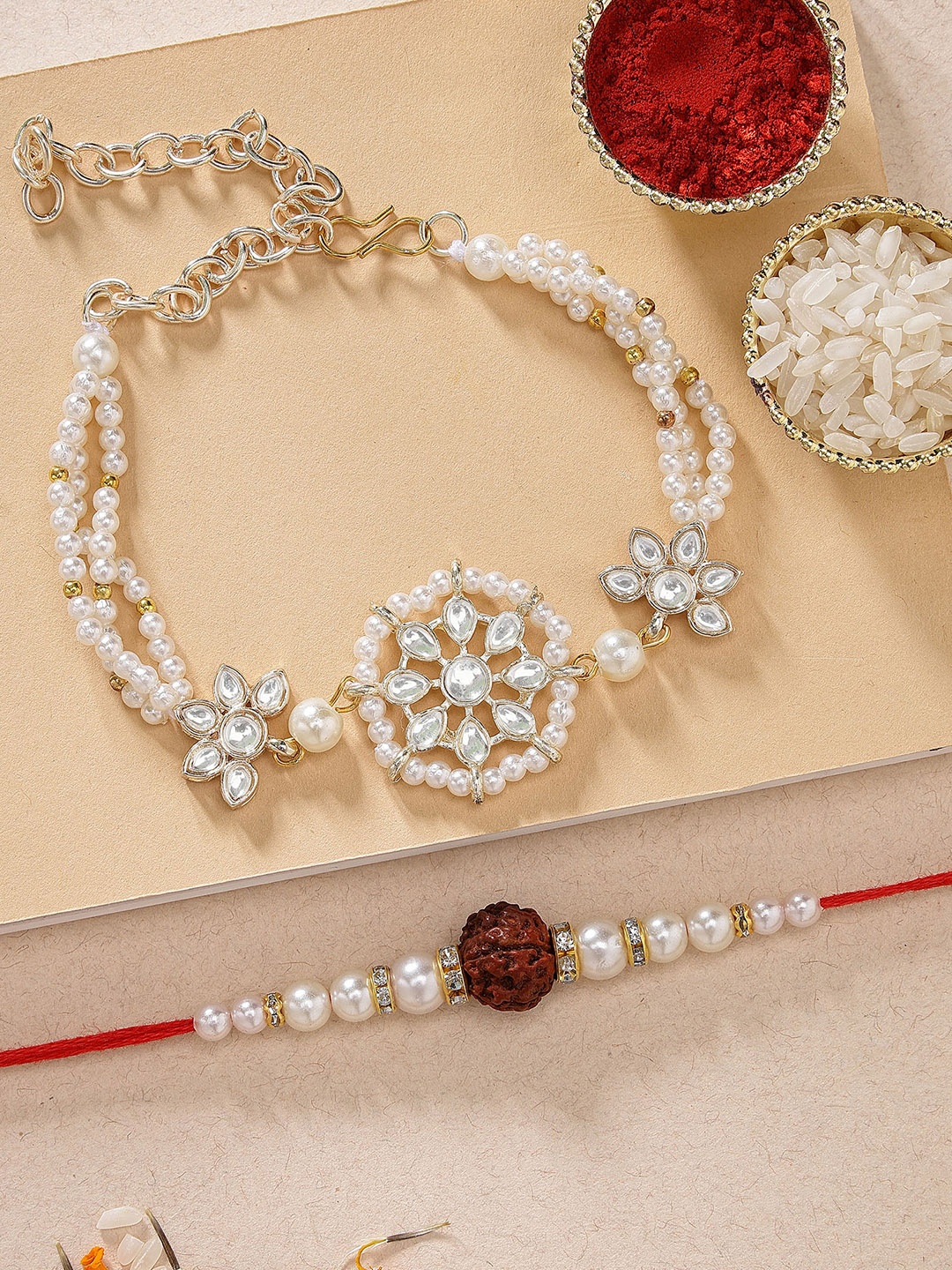 KARATCART Set of 2 Gold-Plated Red & White Kundan-Studs & Beaded Bhaiya Bhabhi Rakhi With Roli & Chawal
KARATCART Set of 2 Gold-Plated Red & White Kundan-Studs & Beaded Bhaiya Bhabhi Rakhi With Roli & Chawal
