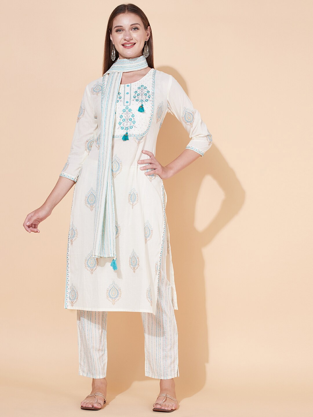 FASHOR Women Off White Floral Embroidered High Slit Cotton Kurti with Trousers & Dupatta
FASHOR Women Off White Floral Embroidered High Slit Cotton Kurti with Trousers & Dupatta