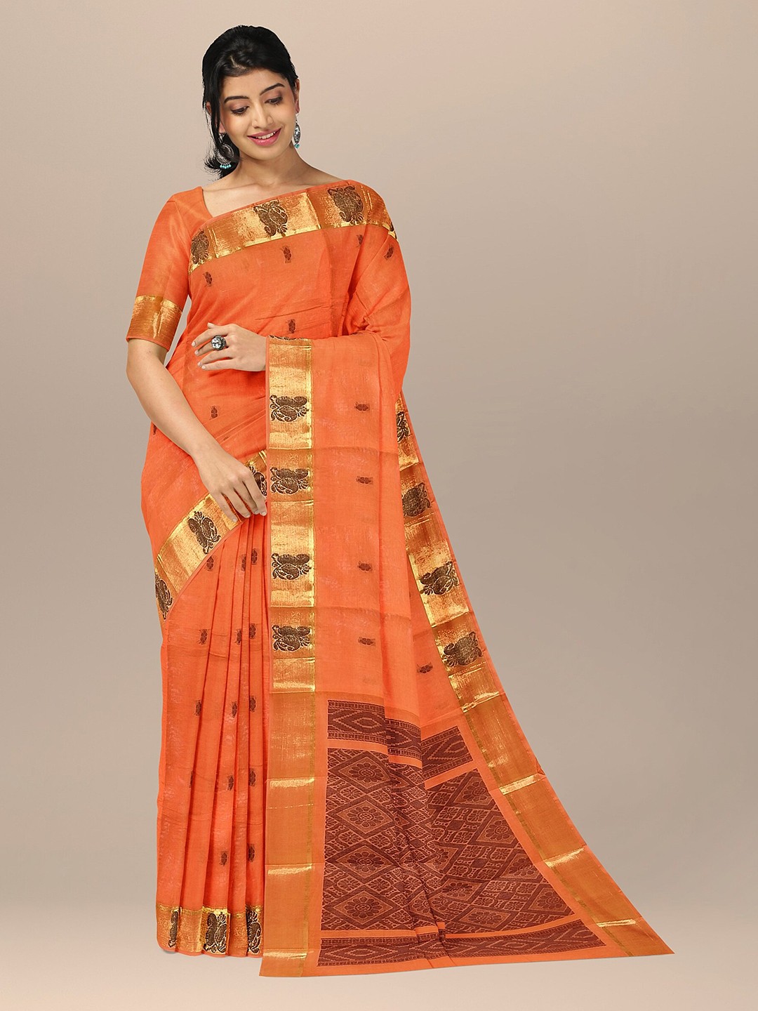 The Chennai Silks Orange & Gold-Toned Ethnic Motifs Zari Pure Cotton Fusion Kovai Saree
The Chennai Silks Orange & Gold-Toned Ethnic Motifs Zari Pure Cotton Fusion Kovai Saree