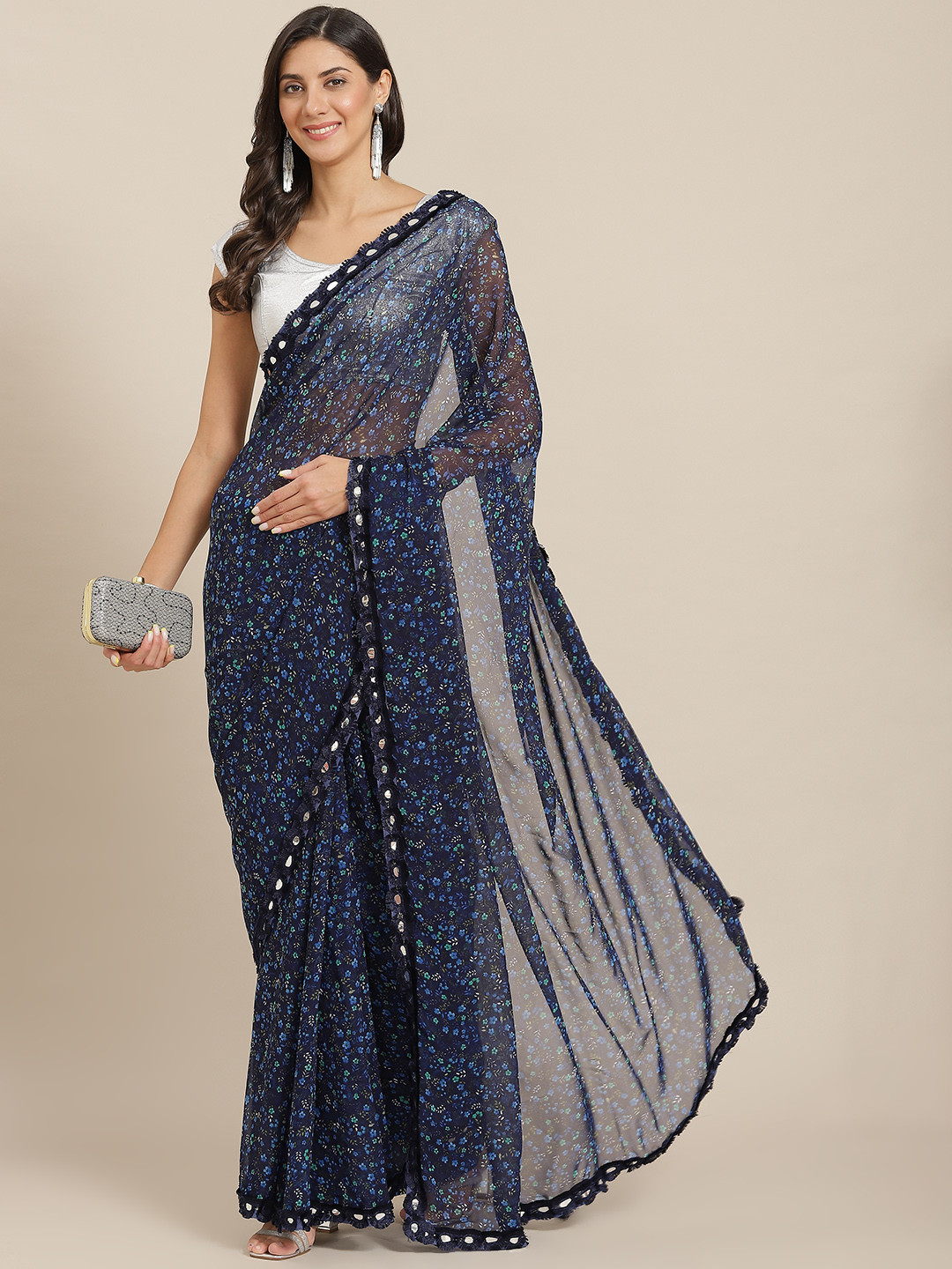 Tikhi Imli Navy Blue Floral Mirror Work Saree
Tikhi Imli Navy Blue Floral Mirror Work Saree