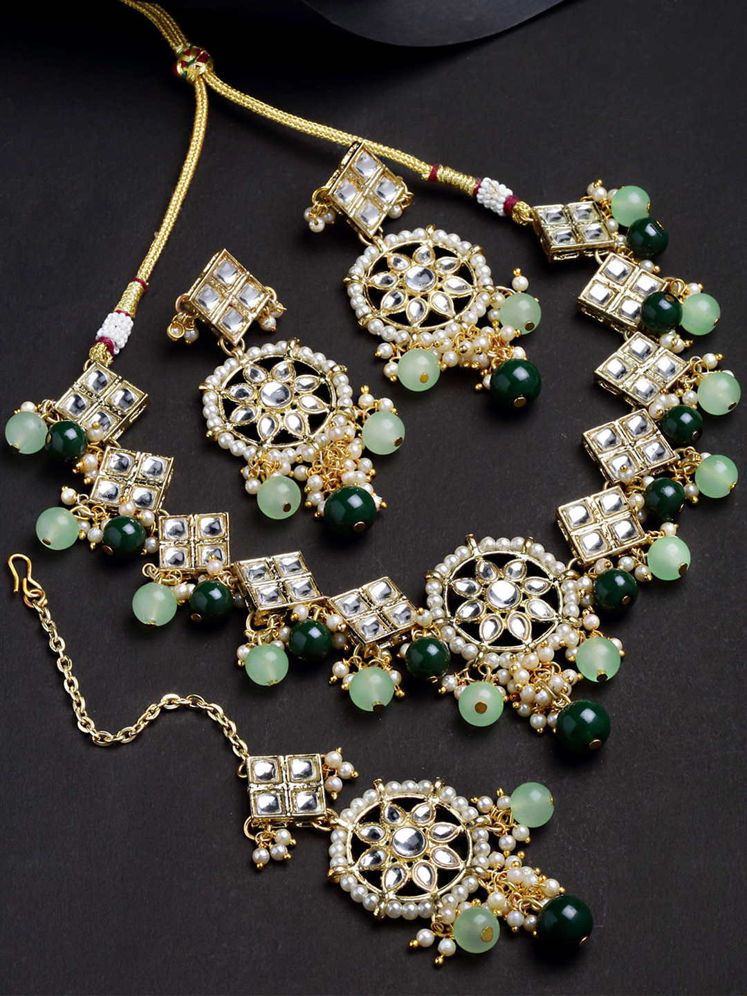 KARATCART Gold-Plated Green Kundan Studded & Beaded Jewellery Set
KARATCART Gold-Plated Green Kundan Studded & Beaded Jewellery Set