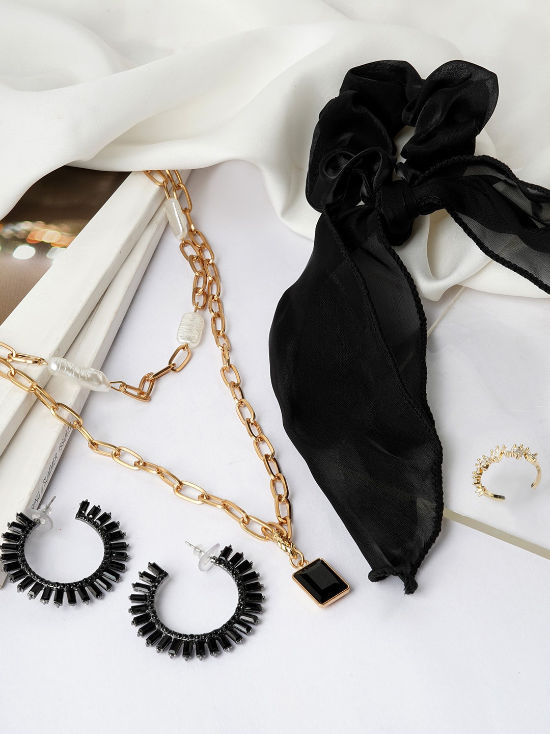 JOKER & WITCH Gold Toned Black & White Artificial Stone Studded Jewellery Set
JOKER & WITCH Gold Toned Black & White Artificial Stone Studded Jewellery Set