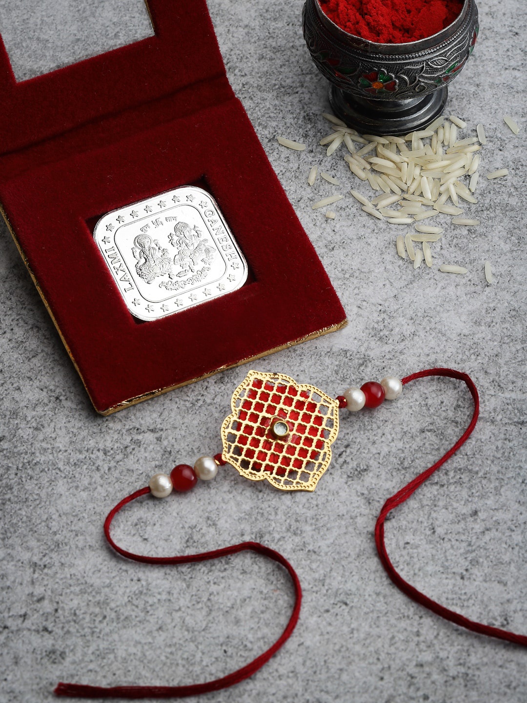 PANASH Men Gold-Plated & Red Rakhi with 10gm Square Lakshmi Ganesha 999 Pure Silver Coin
PANASH Men Gold-Plated & Red Rakhi with 10gm Square Lakshmi Ganesha 999 Pure Silver Coin