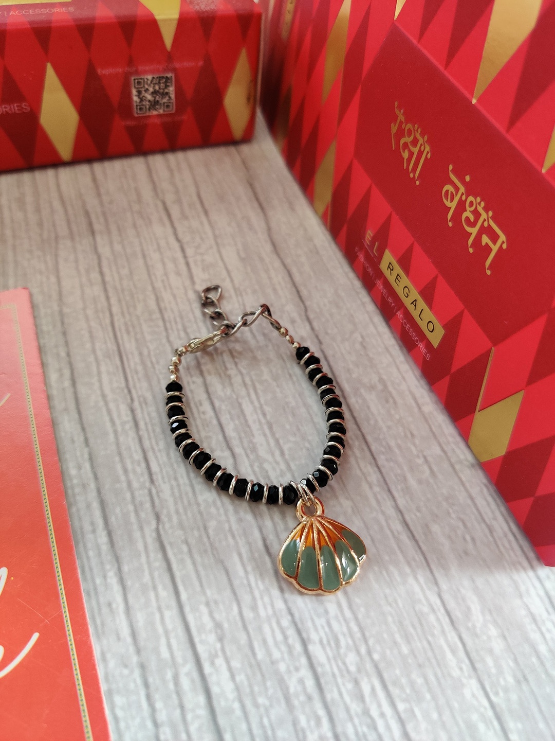 EL REGALO Black Silver Beaded Baby Rakhi With Roli Chawal Raksha Bandhan Greeting Card
EL REGALO Black Silver Beaded Baby Rakhi With Roli Chawal Raksha Bandhan Greeting Card