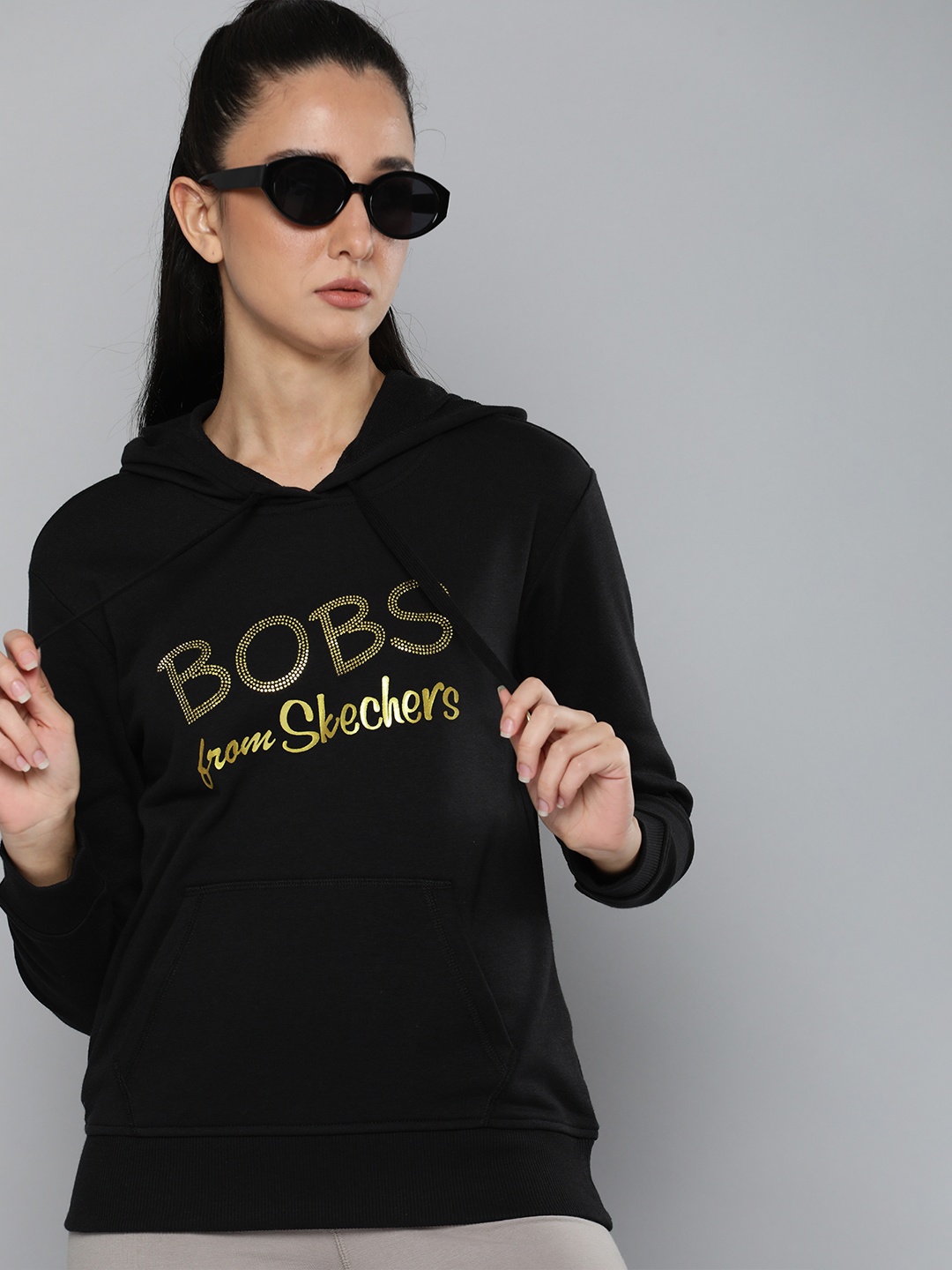 Skechers Women Typography Printed BOBS GOLDEN BONES PO Hooded Sweatshirt, Black
Skechers Women Typography Printed BOBS GOLDEN BONES PO Hooded Sweatshirt, Black