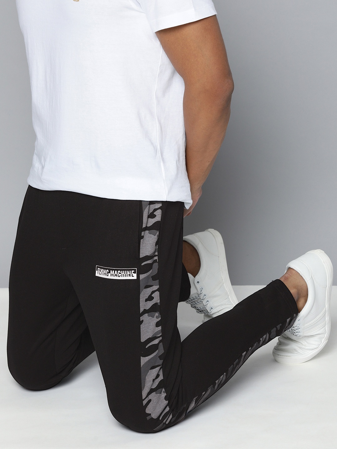 Flying Machine Men Black Brand Logo Applique Regular Track Pants With Side Printed Panels
Flying Machine Men Black Brand Logo Applique Regular Track Pants With Side Printed Panels
