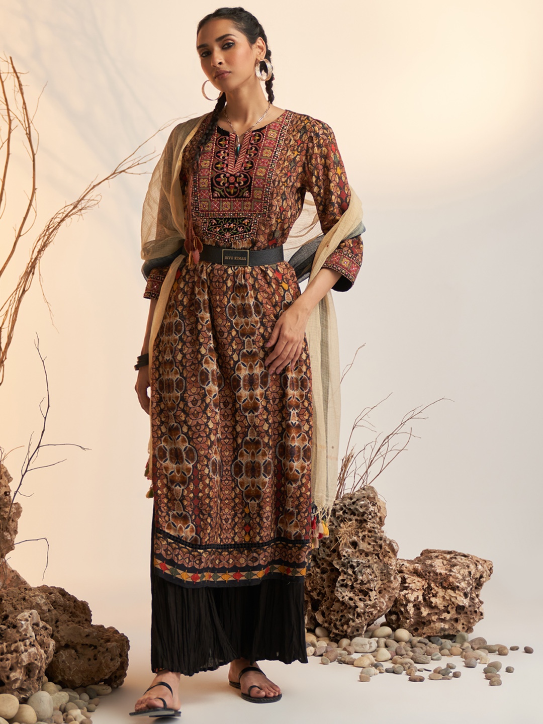 Ritu Kumar Women Brown & Black Ethnic Motifs Yoke Design Kurta with Trousers & Dupatta
Ritu Kumar Women Brown & Black Ethnic Motifs Yoke Design Kurta with Trousers & Dupatta