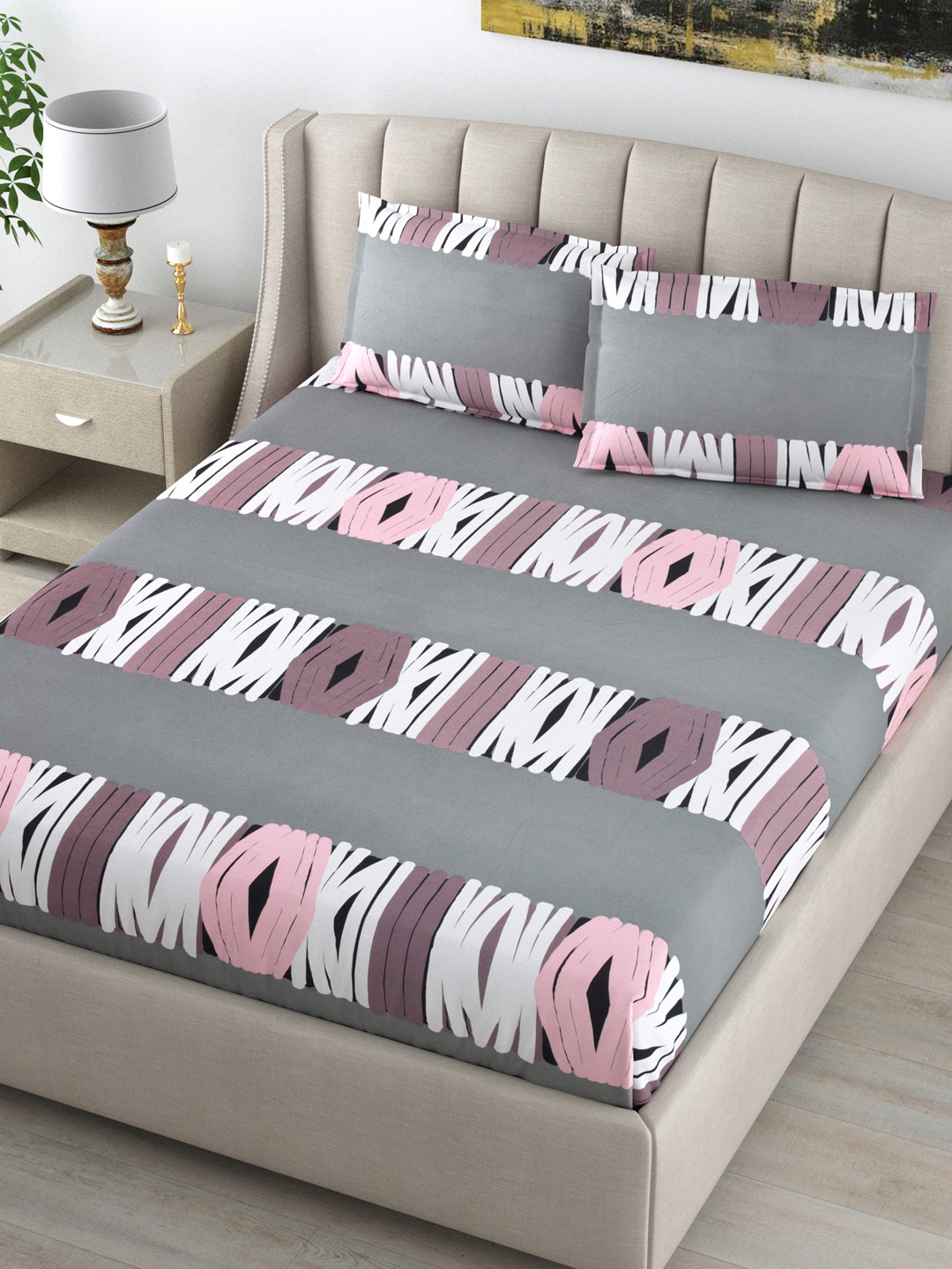 DREAM WEAVERZ Grey and Pink Bedsheet with 2 pillow covers
DREAM WEAVERZ Grey and Pink Bedsheet with 2 pillow covers