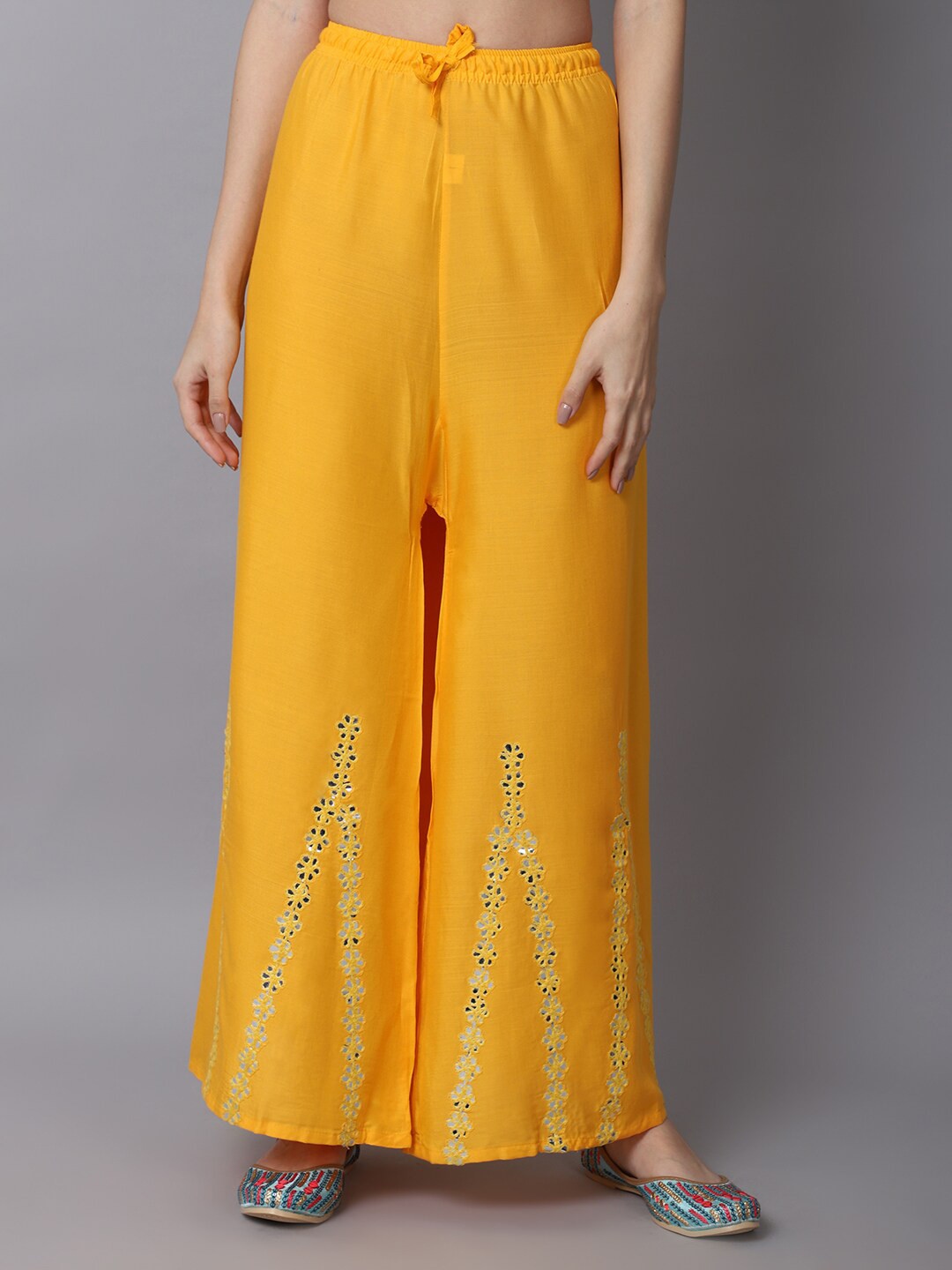 GRACIT Women Yellow & White Floral Embroidered Flared Ethnic Palazzos
GRACIT Women Yellow & White Floral Embroidered Flared Ethnic Palazzos