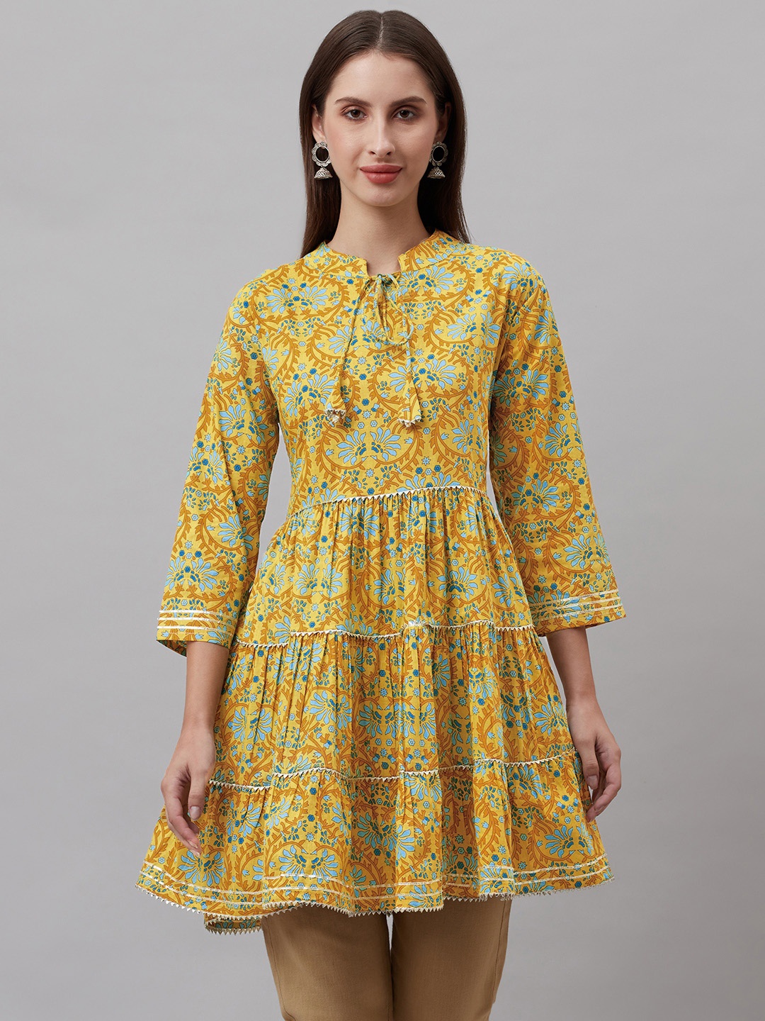 HIGHLIGHT FASHION EXPORT Mustard Yellow & Blue Floral Printed Gotta Patti Tiered Kurti
HIGHLIGHT FASHION EXPORT Mustard Yellow & Blue Floral Printed Gotta Patti Tiered Kurti