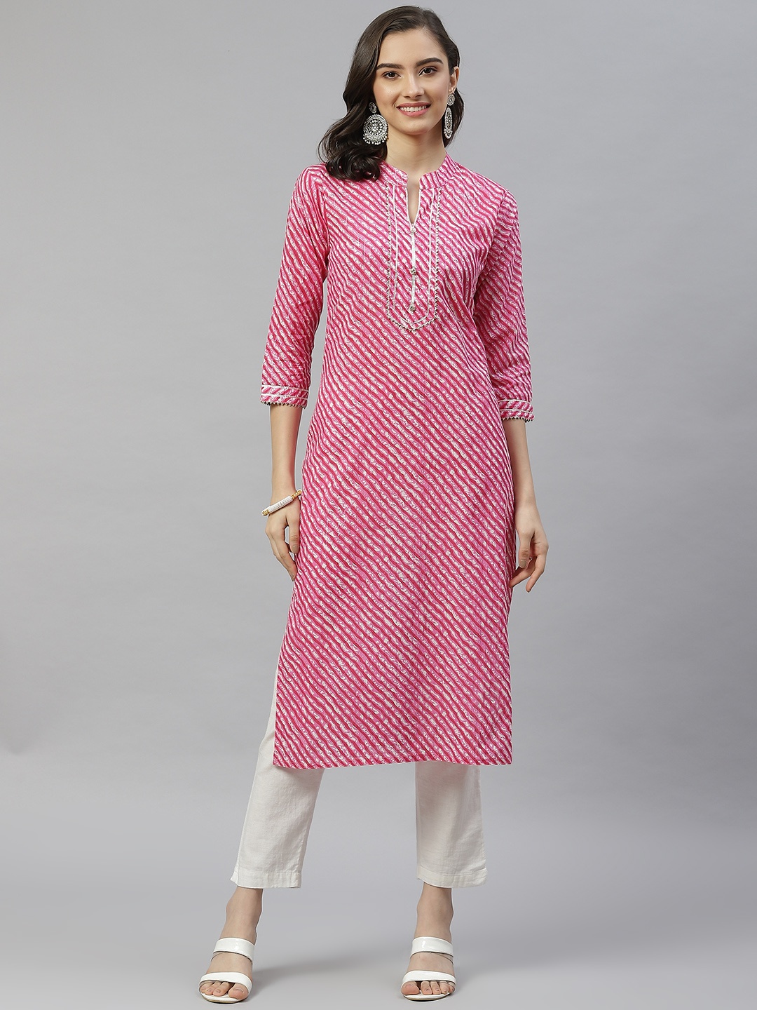 HIGHLIGHT FASHION EXPORT Women Pink & White Leheriya Printed Cotton Gotta Patti Kurta
HIGHLIGHT FASHION EXPORT Women Pink & White Leheriya Printed Cotton Gotta Patti Kurta