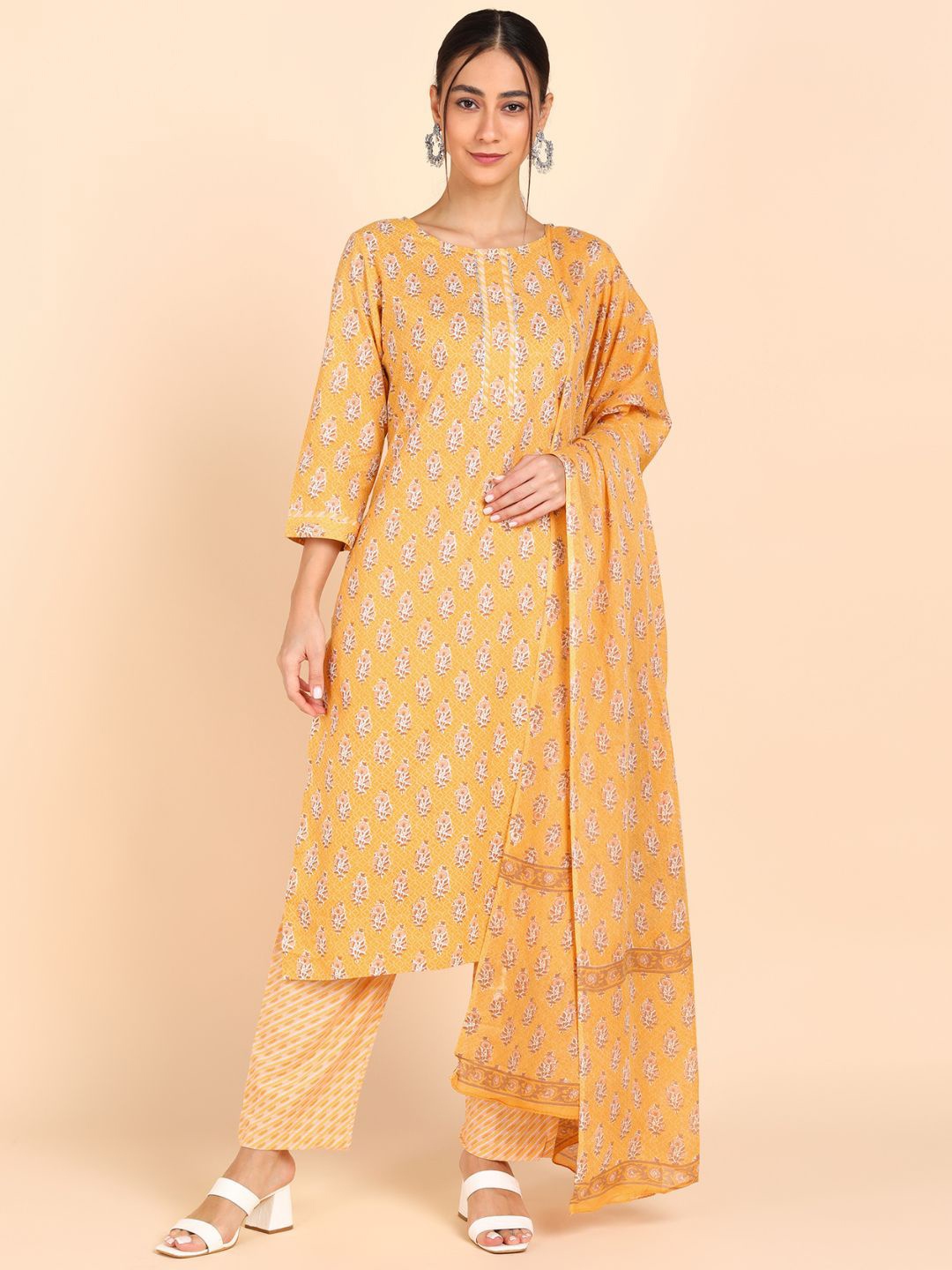 VEDANA Women Yellow Ethnic Motifs Printed Pure Cotton Kurta with Trousers & With Dupatta
VEDANA Women Yellow Ethnic Motifs Printed Pure Cotton Kurta with Trousers & With Dupatta