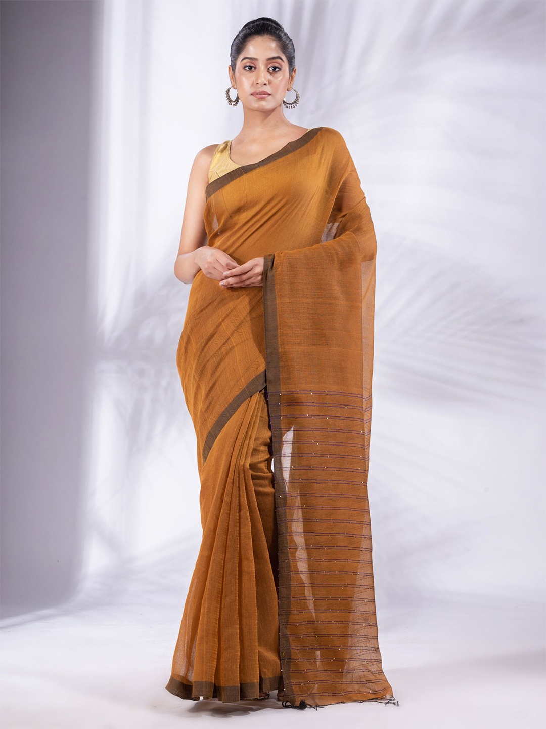 Charukriti Brown Solid Pure Cotton Saree