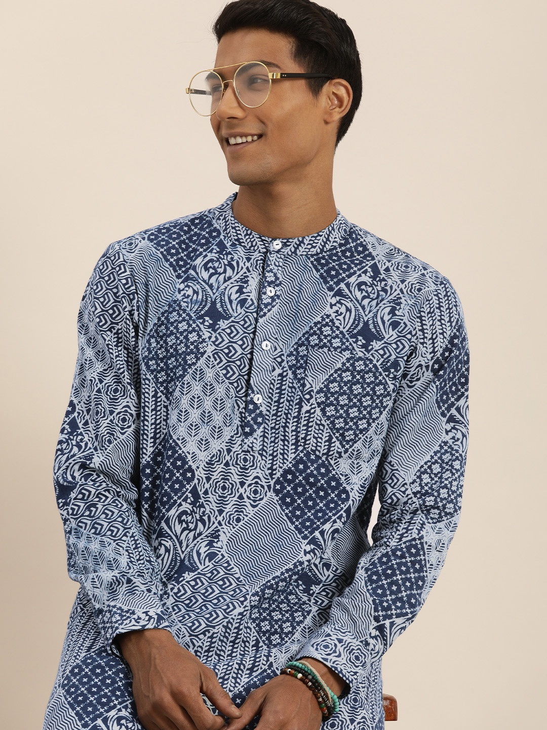 Taavi Men Navy Blue Indigo Hand Block Printed Pure Cotton Sustainable Kurta with Trousers
Taavi Men Navy Blue Indigo Hand Block Printed Pure Cotton Sustainable Kurta with Trousers