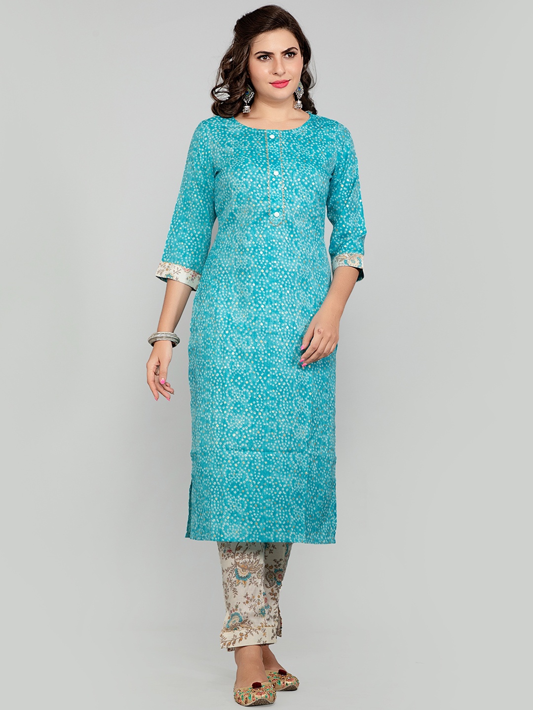 POONAM DESIGNER Women Blue and Cream Ethnic Motifs Printed Pure Cotton Kurta with Trousers
POONAM DESIGNER Women Blue and Cream Ethnic Motifs Printed Pure Cotton Kurta with Trousers