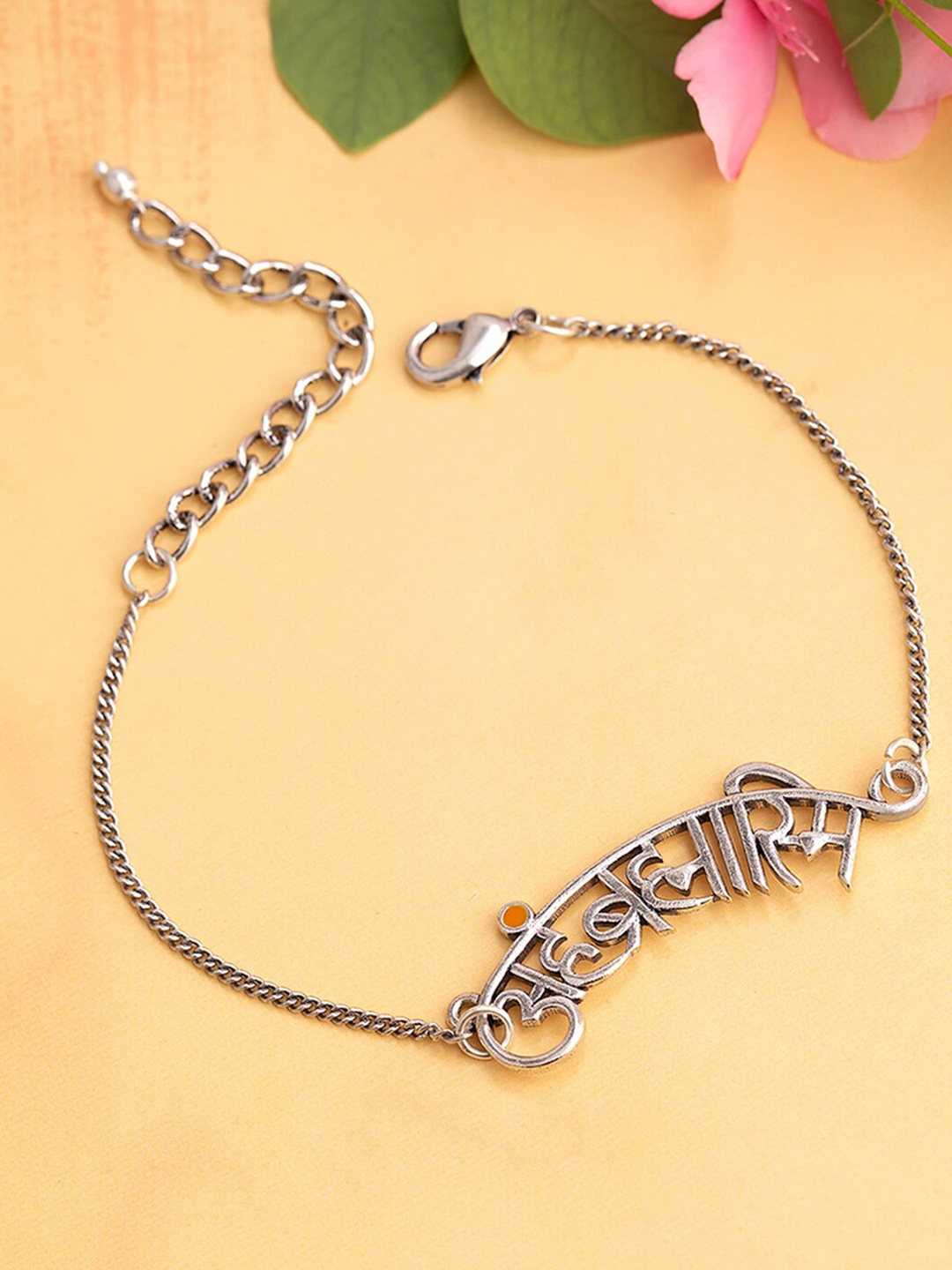 Voylla Women Silver & Orange Brass Silver-Plated Aham Brahmasmi InscriptionLink Bracelet
Voylla Women Silver & Orange Brass Silver-Plated Aham Brahmasmi InscriptionLink Bracelet