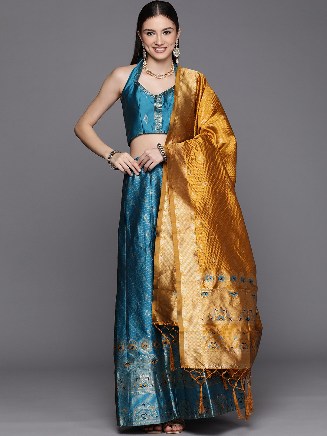 Mitera Women Turquoise Blue & Gold-Toned Semi-Stitched Lehenga Unstitched Blouse & Dupatta
Mitera Women Turquoise Blue & Gold-Toned Semi-Stitched Lehenga Unstitched Blouse & Dupatta