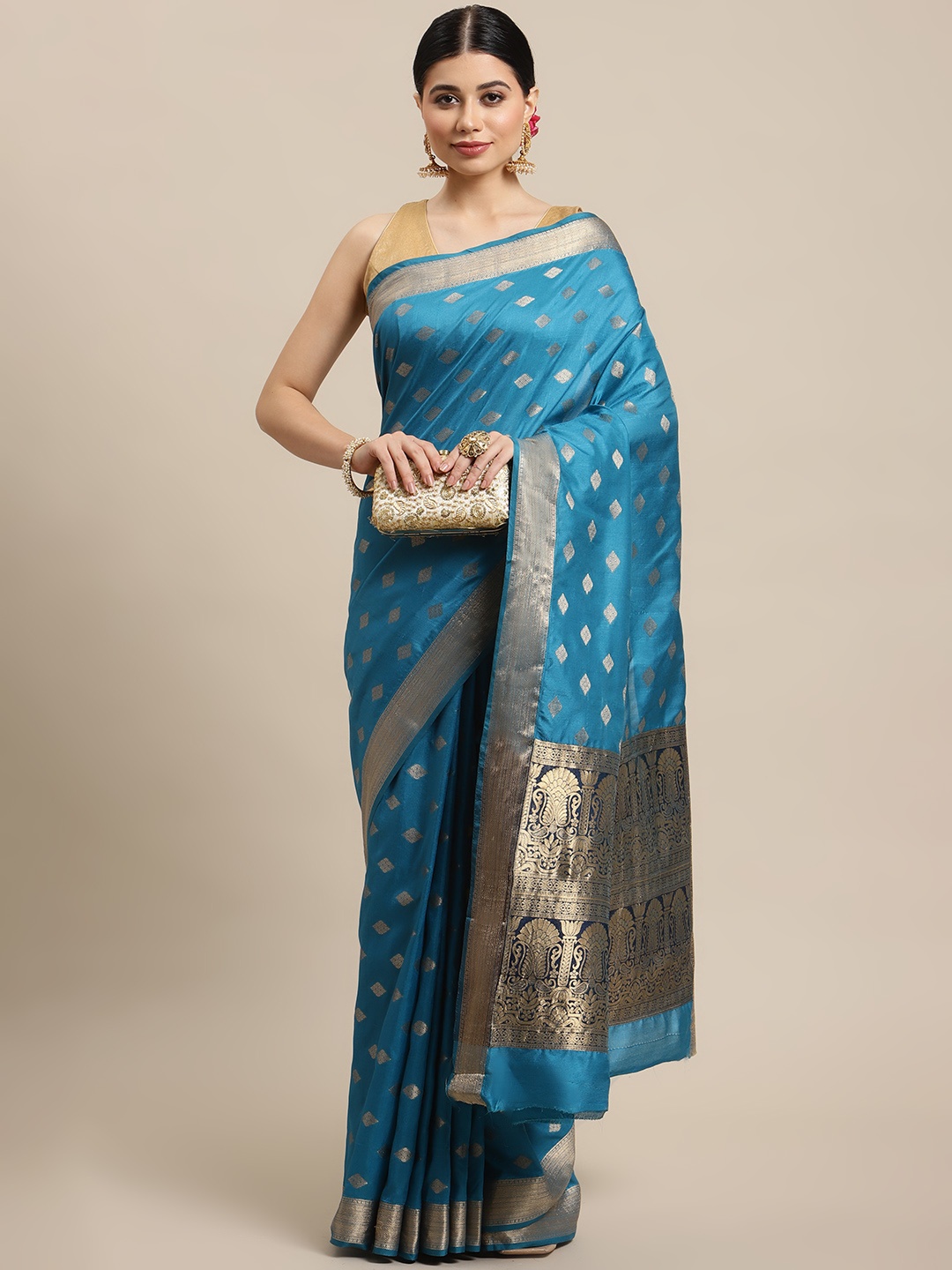 SHOPGARB Turquoise Blue & Golden Ethnic Motifs Zari Silk Blend Banarasi Saree
SHOPGARB Turquoise Blue & Golden Ethnic Motifs Zari Silk Blend Banarasi Saree