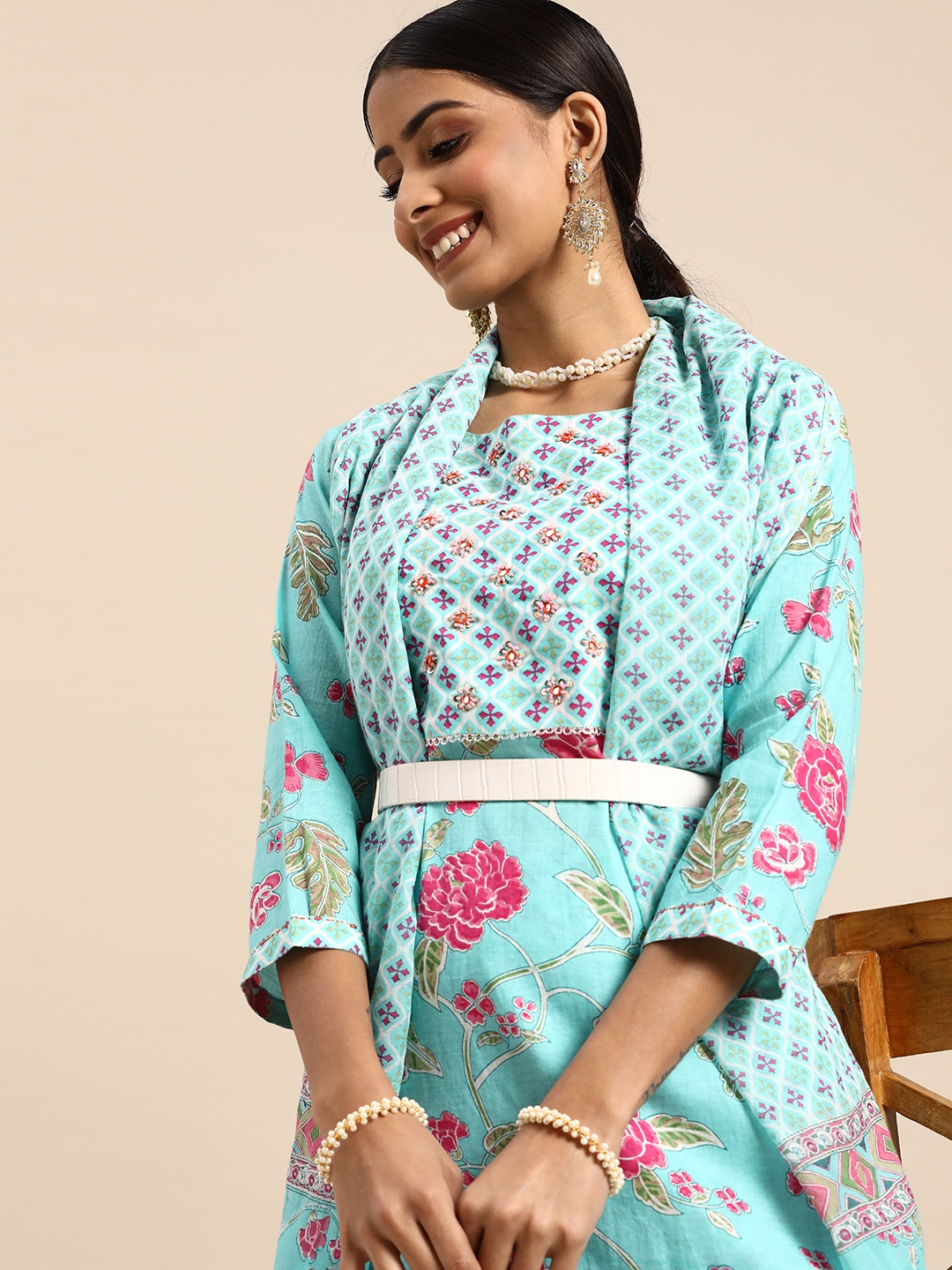 Sangria Women Blue & Pink Floral Yoke Design Sequinned Cotton Kurta Trousers & Dupatta
Sangria Women Blue & Pink Floral Yoke Design Sequinned Cotton Kurta Trousers & Dupatta