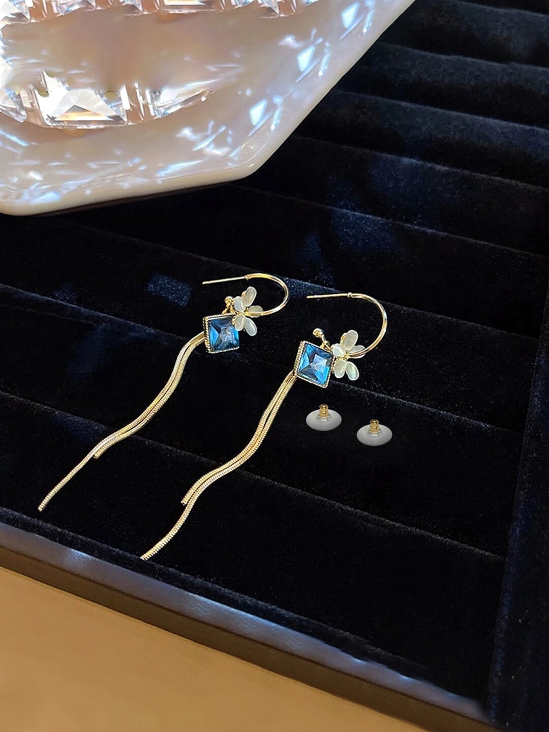 Yellow Chimes Gold Tone Flower and Blue Crystal Studded Linear Chain Dangler Earrings
Yellow Chimes Gold Tone Flower and Blue Crystal Studded Linear Chain Dangler Earrings