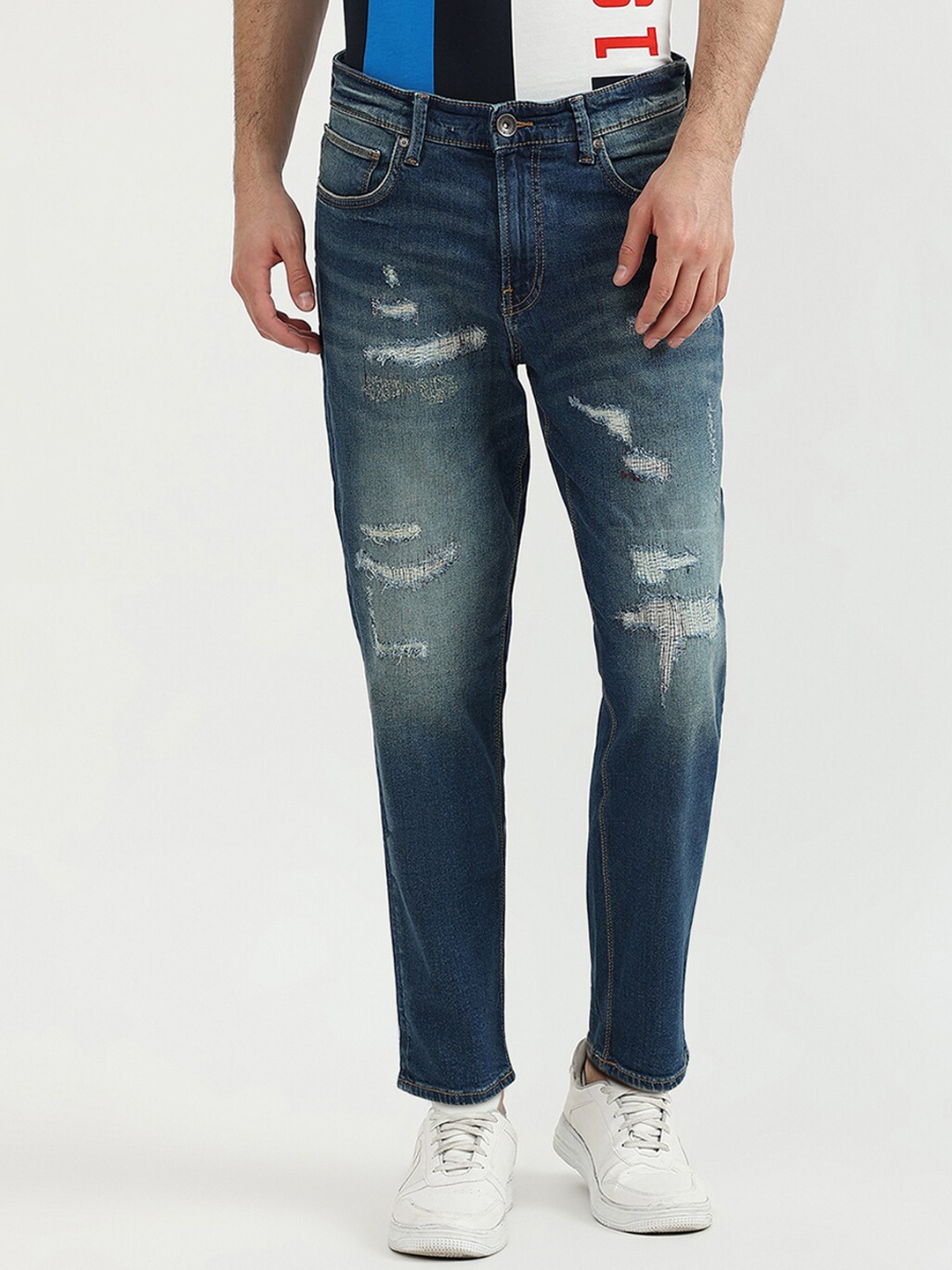 United Colors of Benetton Men Blue Slim Fit Mildly Distressed Heavy Fade Ripped Jeans
United Colors of Benetton Men Blue Slim Fit Mildly Distressed Heavy Fade Ripped Jeans