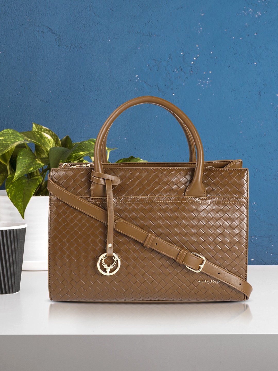 Allen Solly Brown Textured PU Regular Structured Handheld Bag with Brand Logo Tassel
Allen Solly Brown Textured PU Regular Structured Handheld Bag with Brand Logo Tassel