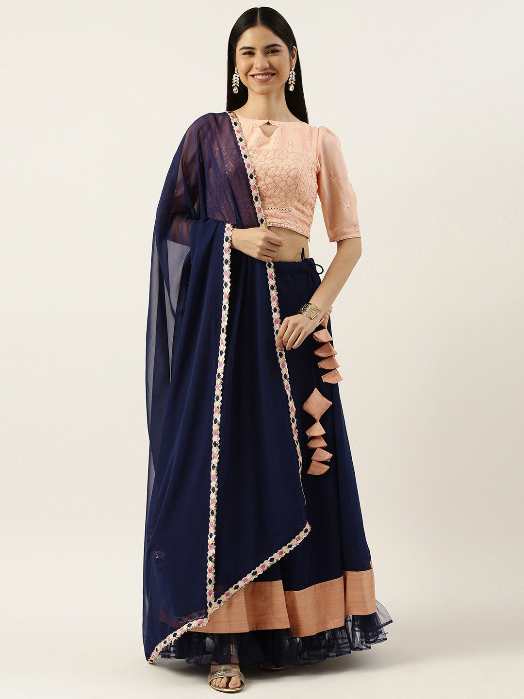 Ethnovog Peach-Coloured Navy Blue Embroidered Made to Measure Lehenga Blouse With Dupatta
Ethnovog Peach-Coloured Navy Blue Embroidered Made to Measure Lehenga Blouse With Dupatta