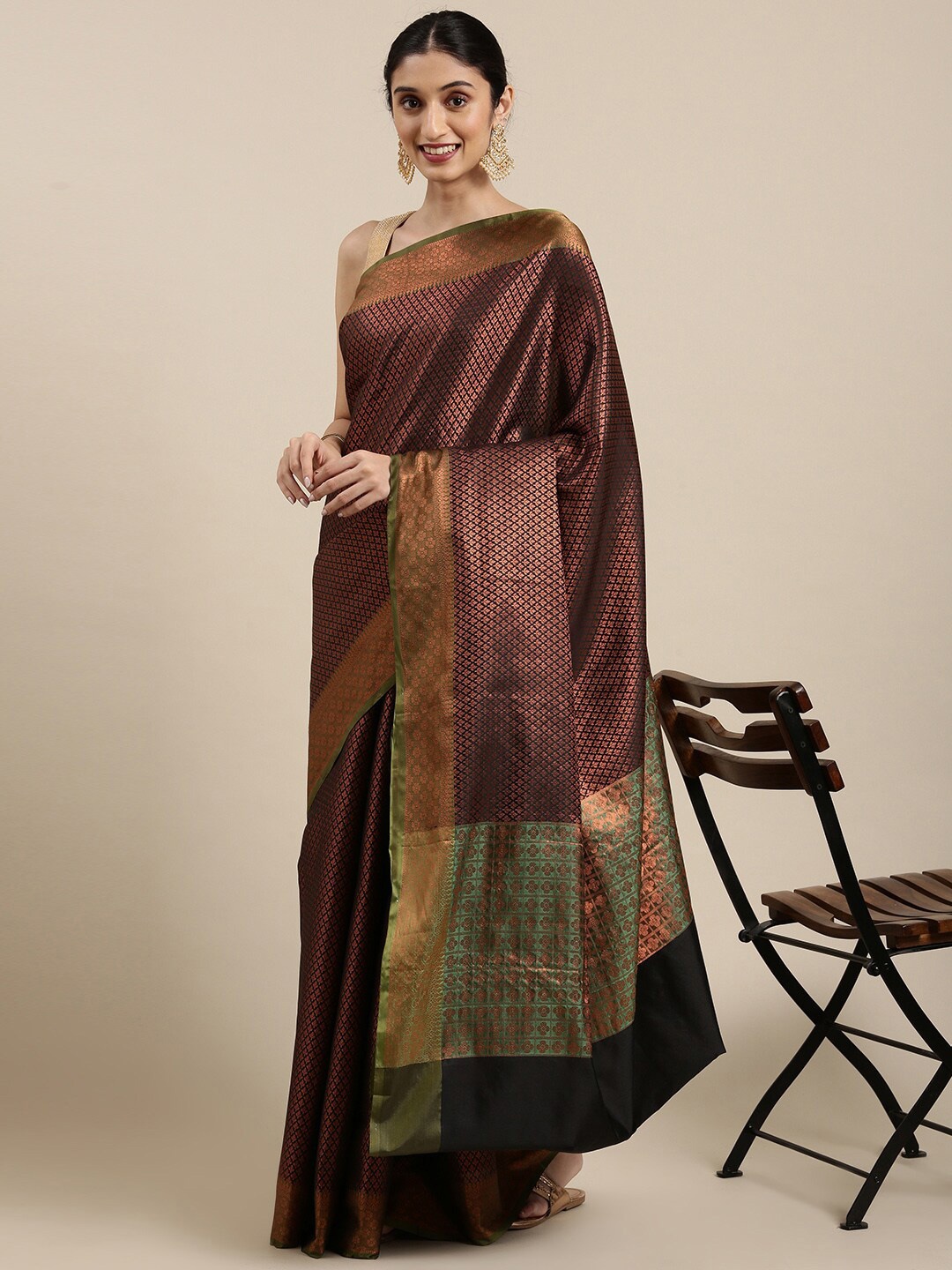 The Chennai Silks Black & Copper-Toned Ethnic Motifs Zari Art Silk Kanjeevaram Saree
The Chennai Silks Black & Copper-Toned Ethnic Motifs Zari Art Silk Kanjeevaram Saree