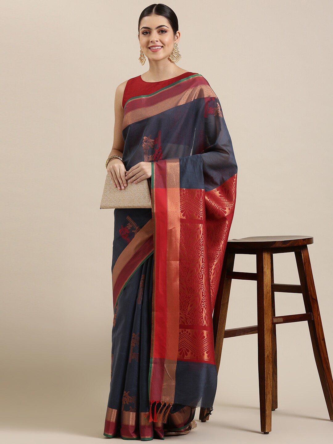 The Chennai Silks Grey & Orange Ethnic Motifs Zari Silk Cotton Fusion Maheshwari Saree
The Chennai Silks Grey & Orange Ethnic Motifs Zari Silk Cotton Fusion Maheshwari Saree