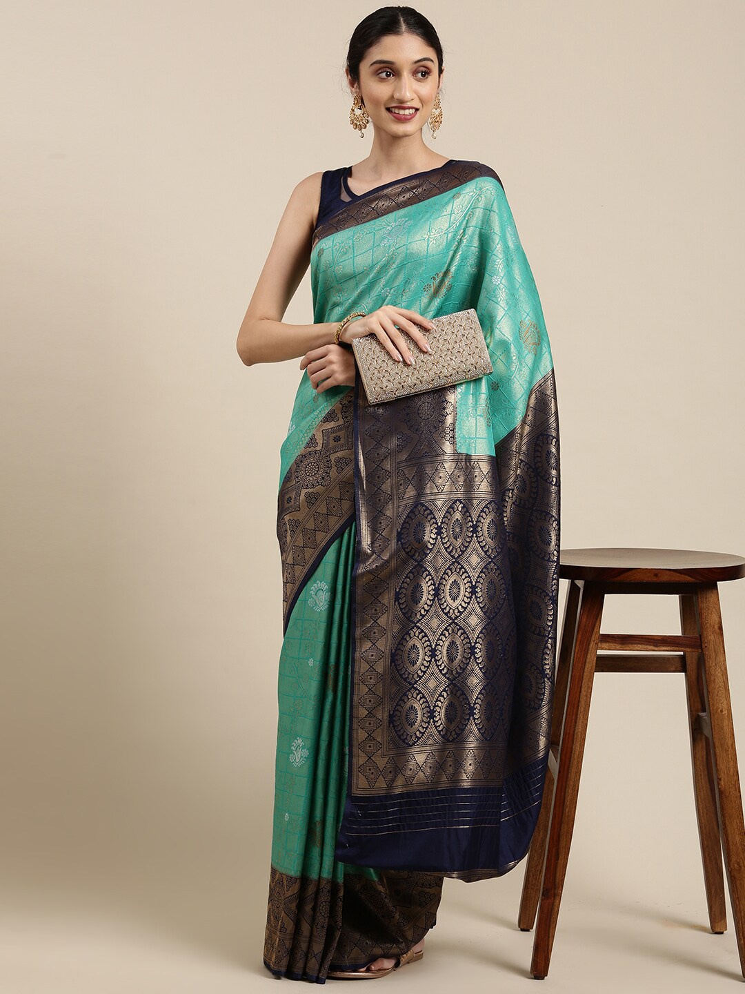 The Chennai Silks Turquoise Blue & Black Ethnic Motifs Zari Art Silk Fusion Kanjeevaram Saree
The Chennai Silks Turquoise Blue & Black Ethnic Motifs Zari Art Silk Fusion Kanjeevaram Saree