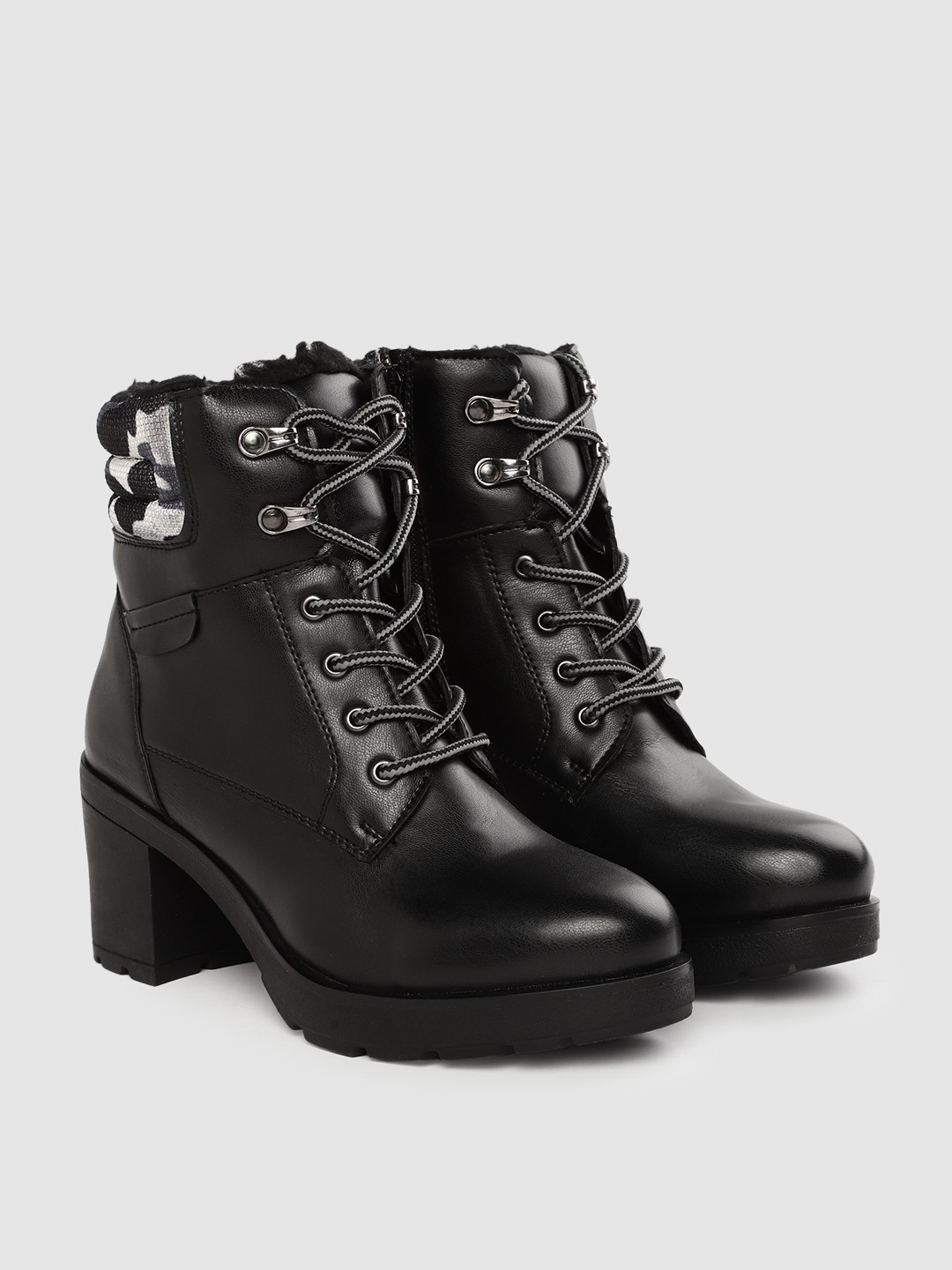 Roadster Women Black Solid Mid Top Platform Heel Boots with Camouflage Print Detail
Roadster Women Black Solid Mid Top Platform Heel Boots with Camouflage Print Detail