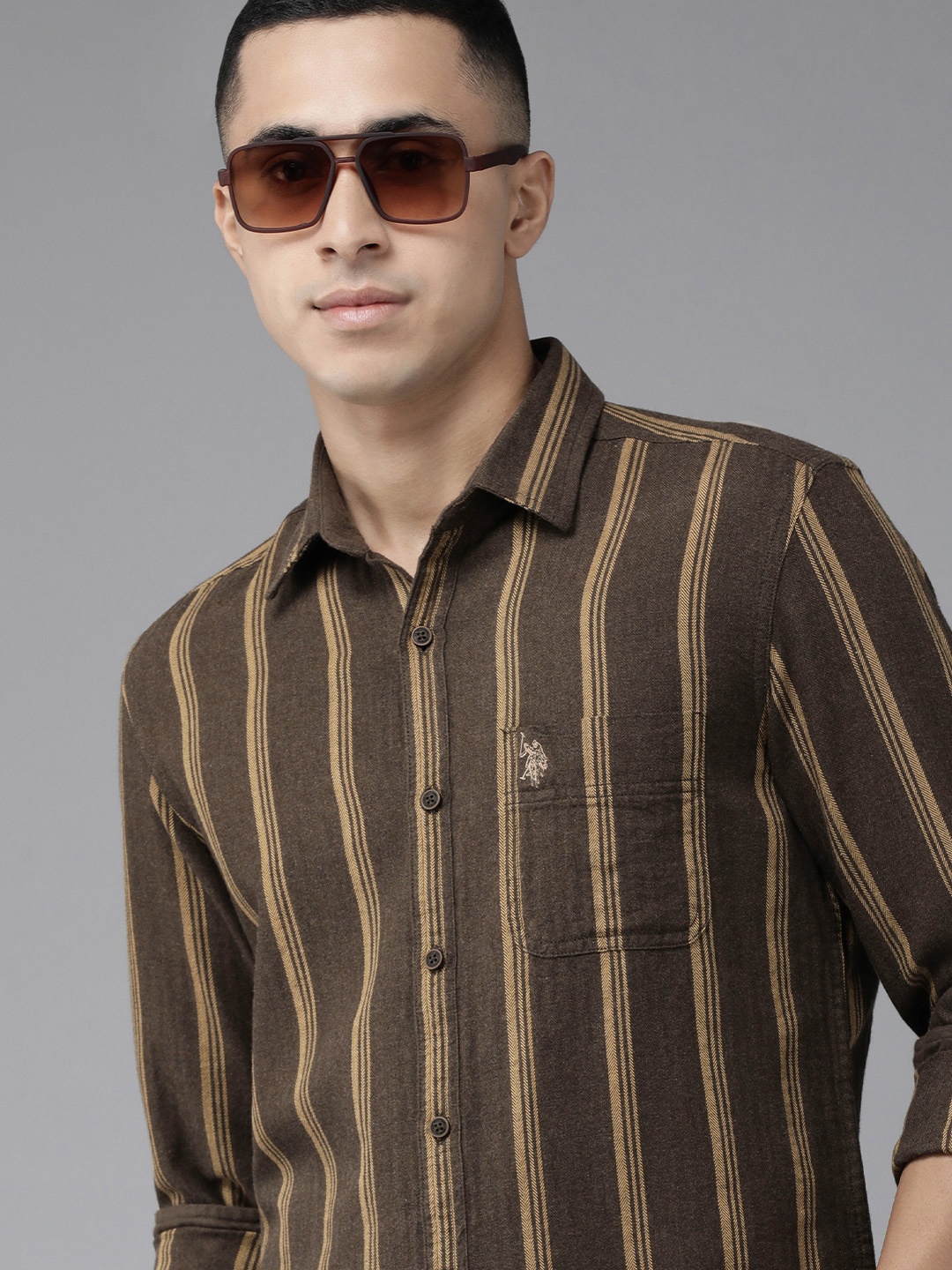 U S Polo Assn Denim Co Men Brown And Beige Slim Fit Striped Pure Cotton Casual Shirt
U S Polo Assn Denim Co Men Brown And Beige Slim Fit Striped Pure Cotton Casual Shirt