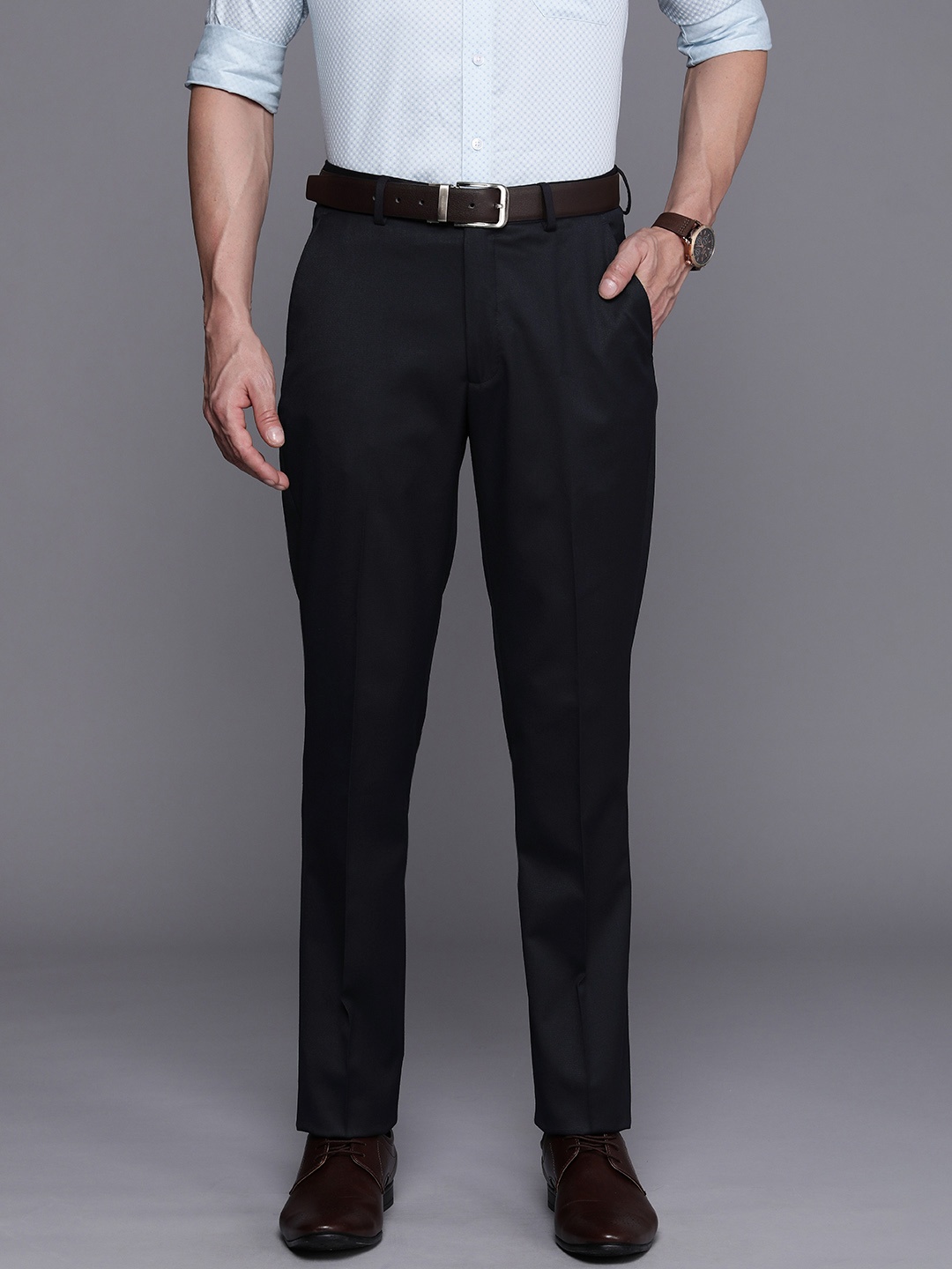 Louis Philippe Men Navy Blue Geometric Self Design Slim Fit Mid-Rise Plain Formal Trousers
Louis Philippe Men Navy Blue Geometric Self Design Slim Fit Mid-Rise Plain Formal Trousers