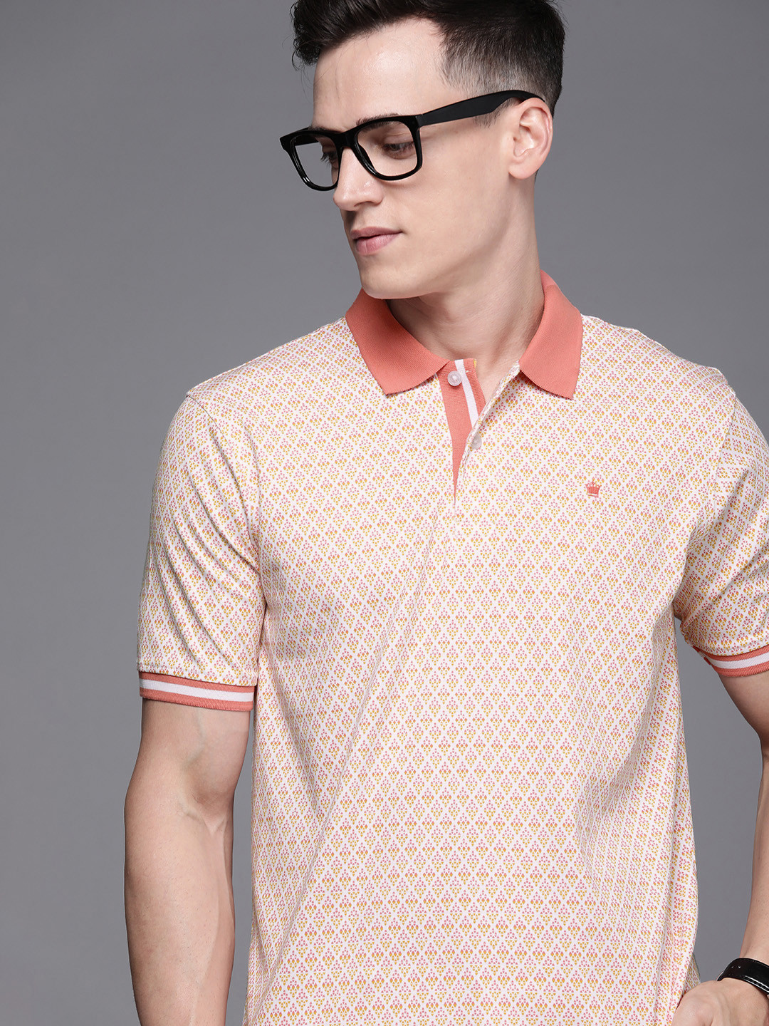 Louis Philippe Men Peach-Coloured & Mustard Yellow Printed Polo Collar Pure Cotton T-shirt
Louis Philippe Men Peach-Coloured & Mustard Yellow Printed Polo Collar Pure Cotton T-shirt
