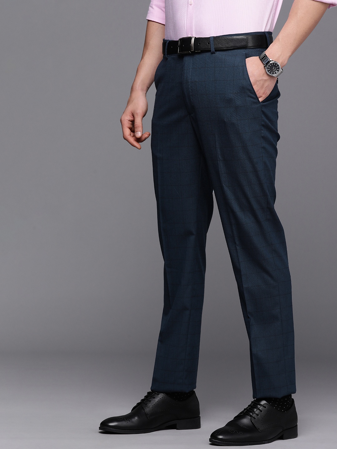 Louis Philippe Men Navy Blue Checked Slim Fit Mid-Rise Plain Flat-Front Formal Trousers
Louis Philippe Men Navy Blue Checked Slim Fit Mid-Rise Plain Flat-Front Formal Trousers