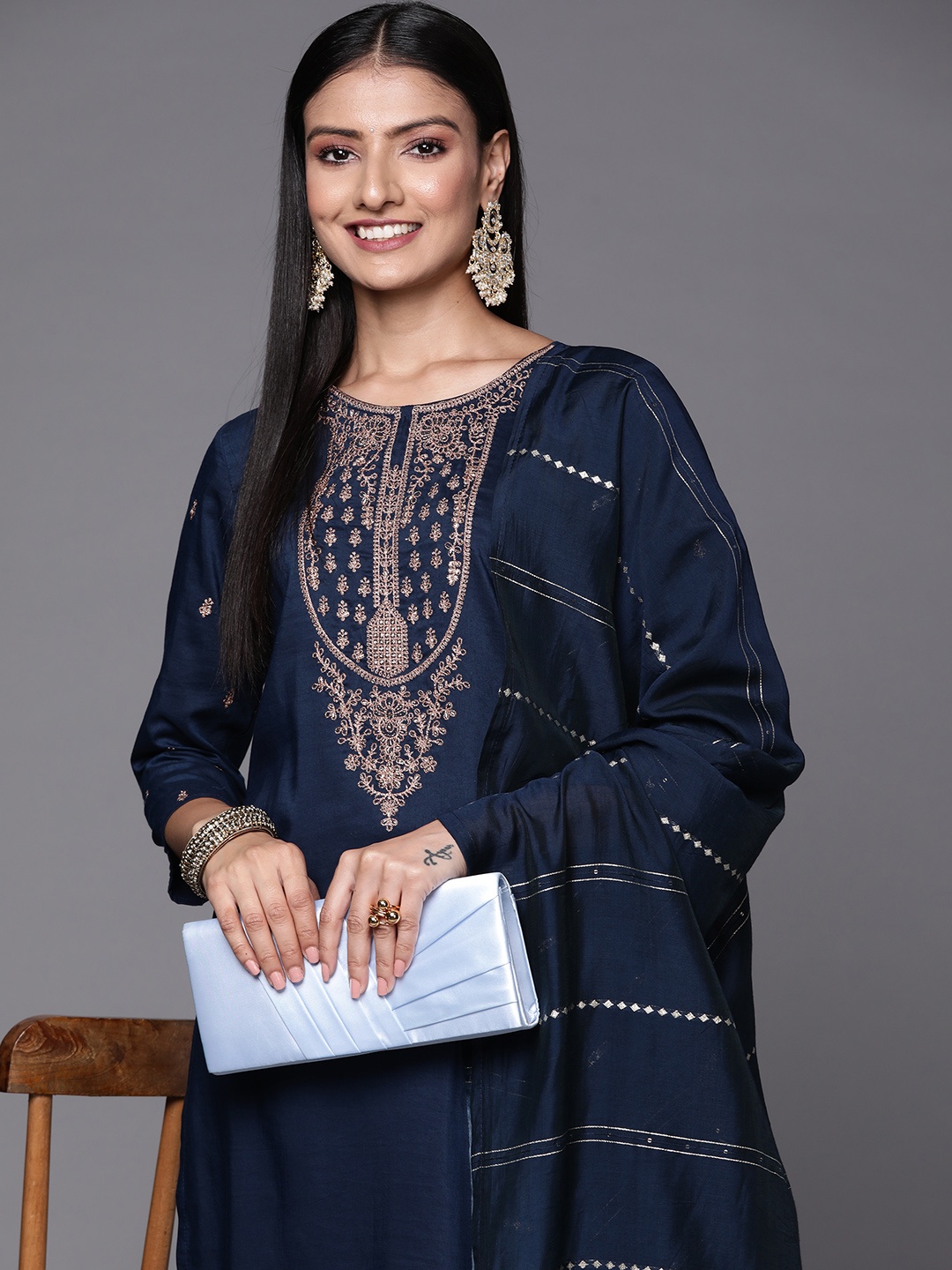 Varanga Women Navy Blue & Golden Ethnic Motifs Embroidered Kurta with Trousers & Dupatta
Varanga Women Navy Blue & Golden Ethnic Motifs Embroidered Kurta with Trousers & Dupatta