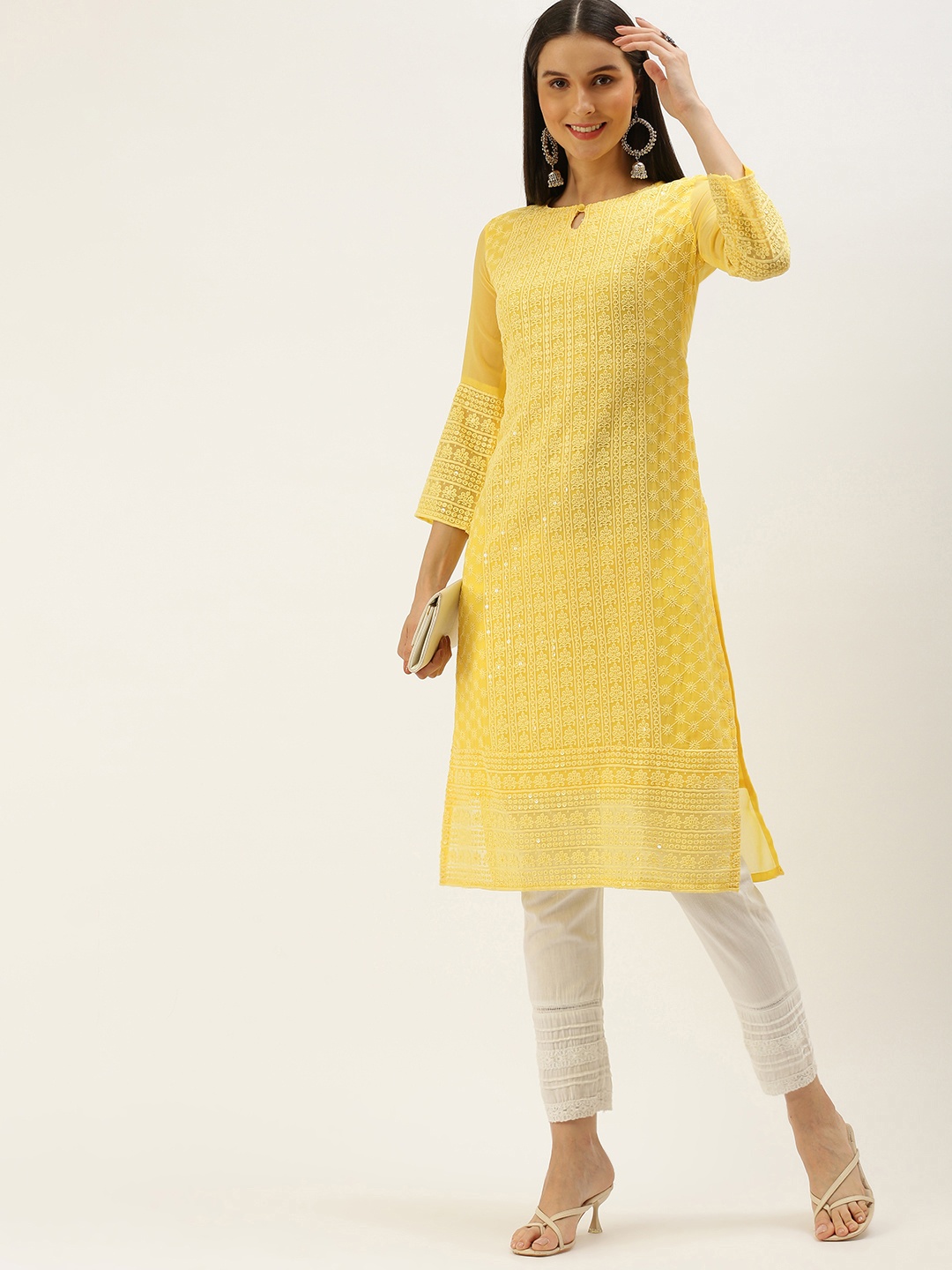 SWAGG INDIA Women Yellow Ethnic Motifs Embroidered Keyhole Neck Chikankari Georgette Kurta
SWAGG INDIA Women Yellow Ethnic Motifs Embroidered Keyhole Neck Chikankari Georgette Kurta