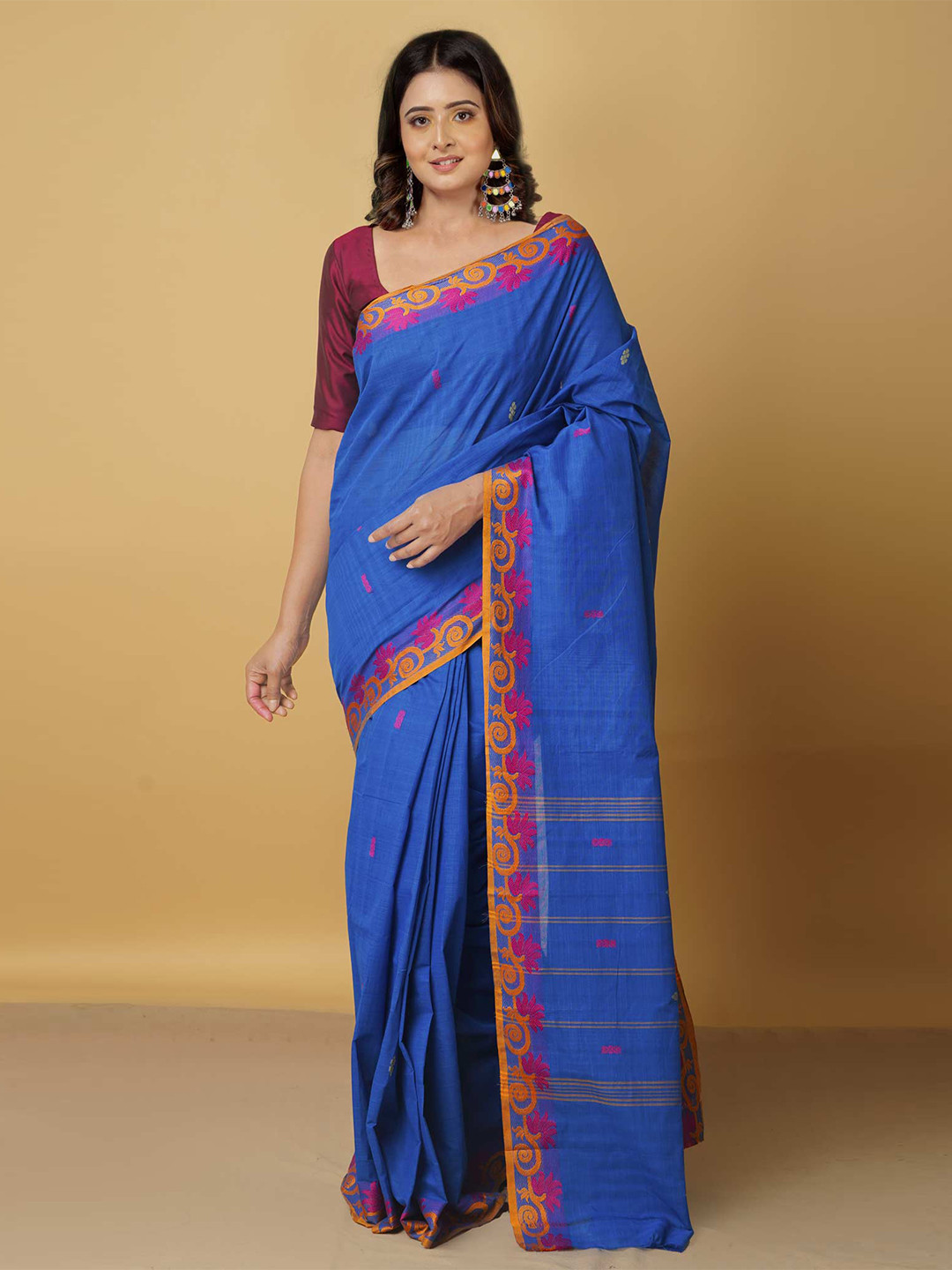 Unnati Silks Women Blue & Orange Woven Design Zari Pure Cotton Venkatgiri Saree
Unnati Silks Women Blue & Orange Woven Design Zari Pure Cotton Venkatgiri Saree