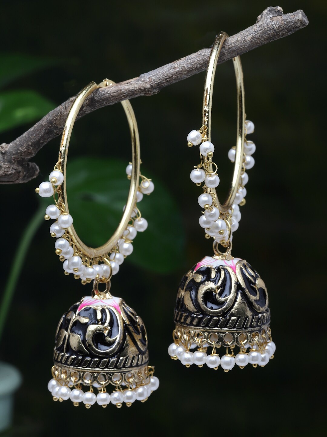 Moedbuille Gold Plated Black Pearls Studded Handpainted Meenakari Handcrafted Jhumkas
Moedbuille Gold Plated Black Pearls Studded Handpainted Meenakari Handcrafted Jhumkas