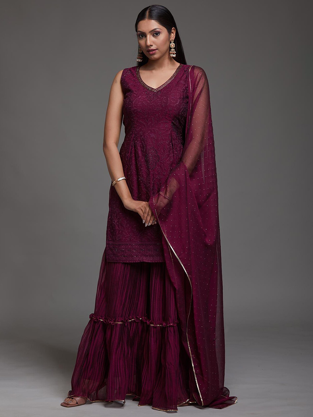 Koskii Women Maroon Ethnic Motifs Embroidered Thread Work Kurta with Sharara & With Dupatta
Koskii Women Maroon Ethnic Motifs Embroidered Thread Work Kurta with Sharara & With Dupatta