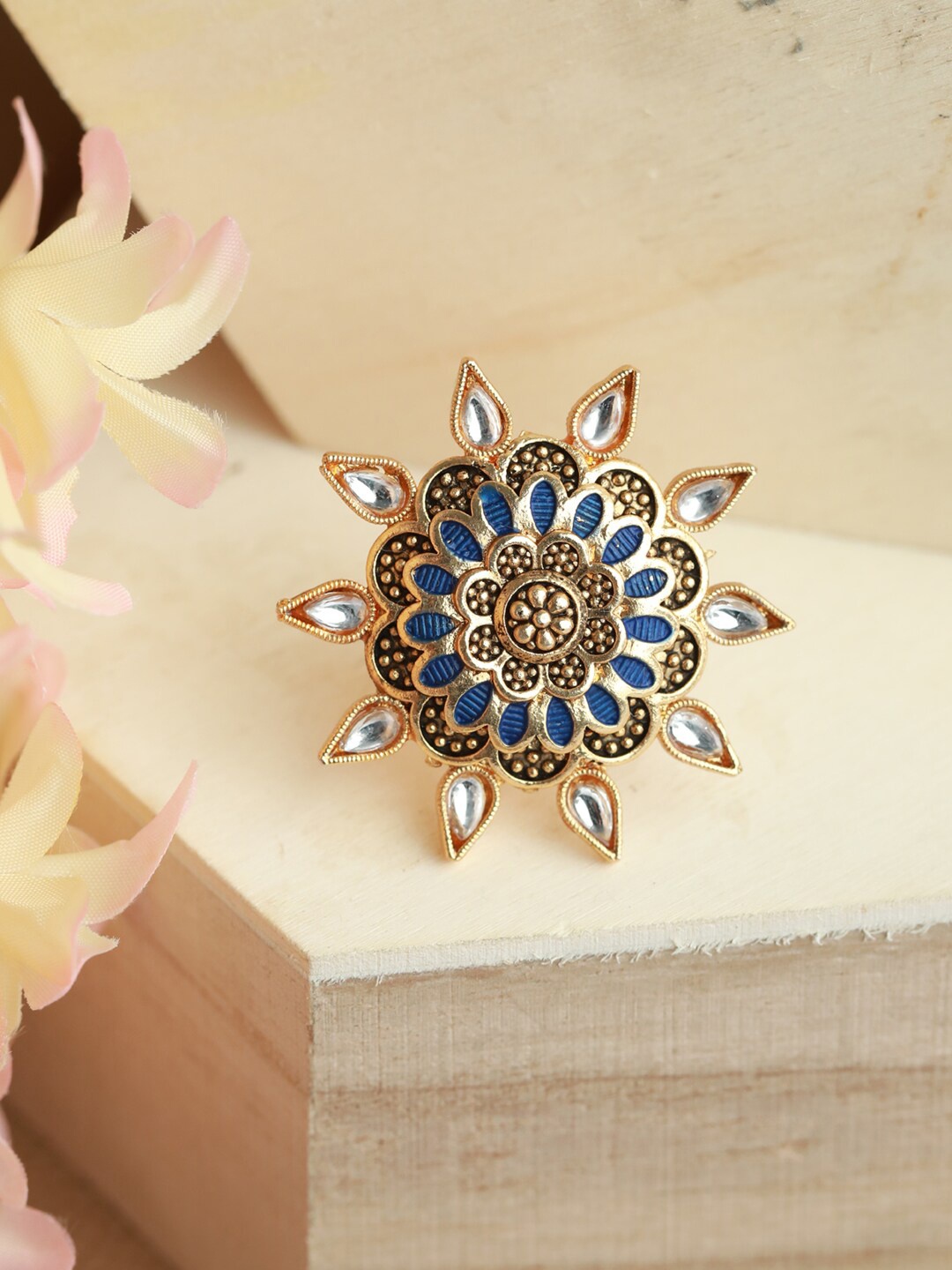 Jazz and Sizzle Gold-Plated Blue Enamelled Kundan Stone-Studded Adjustable Finger Ring
Jazz and Sizzle Gold-Plated Blue Enamelled Kundan Stone-Studded Adjustable Finger Ring
