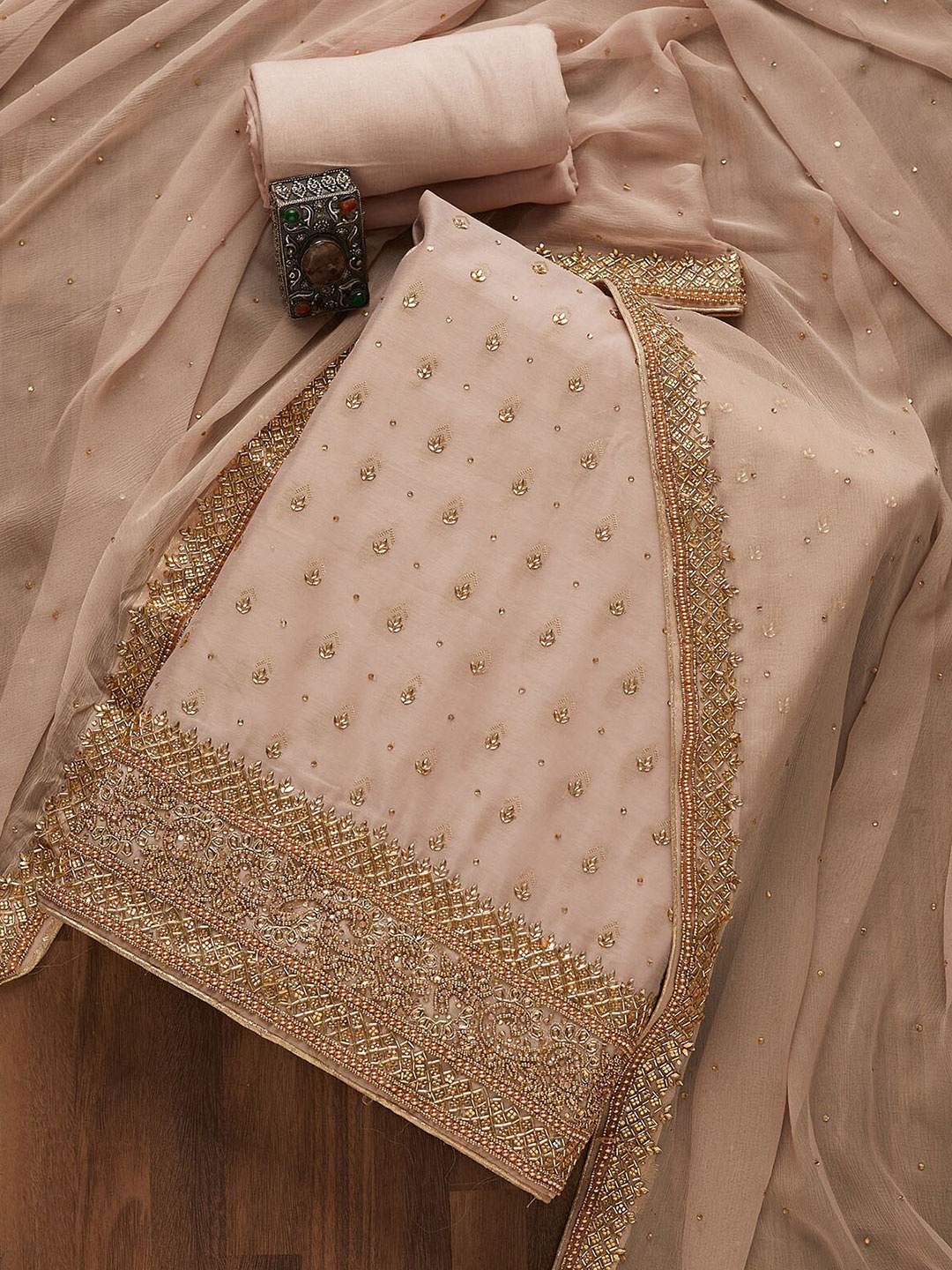 Koskii Peach-Coloured & Gold-Toned Embroidered Art Silk Unstitched Dress Material
Koskii Peach-Coloured & Gold-Toned Embroidered Art Silk Unstitched Dress Material